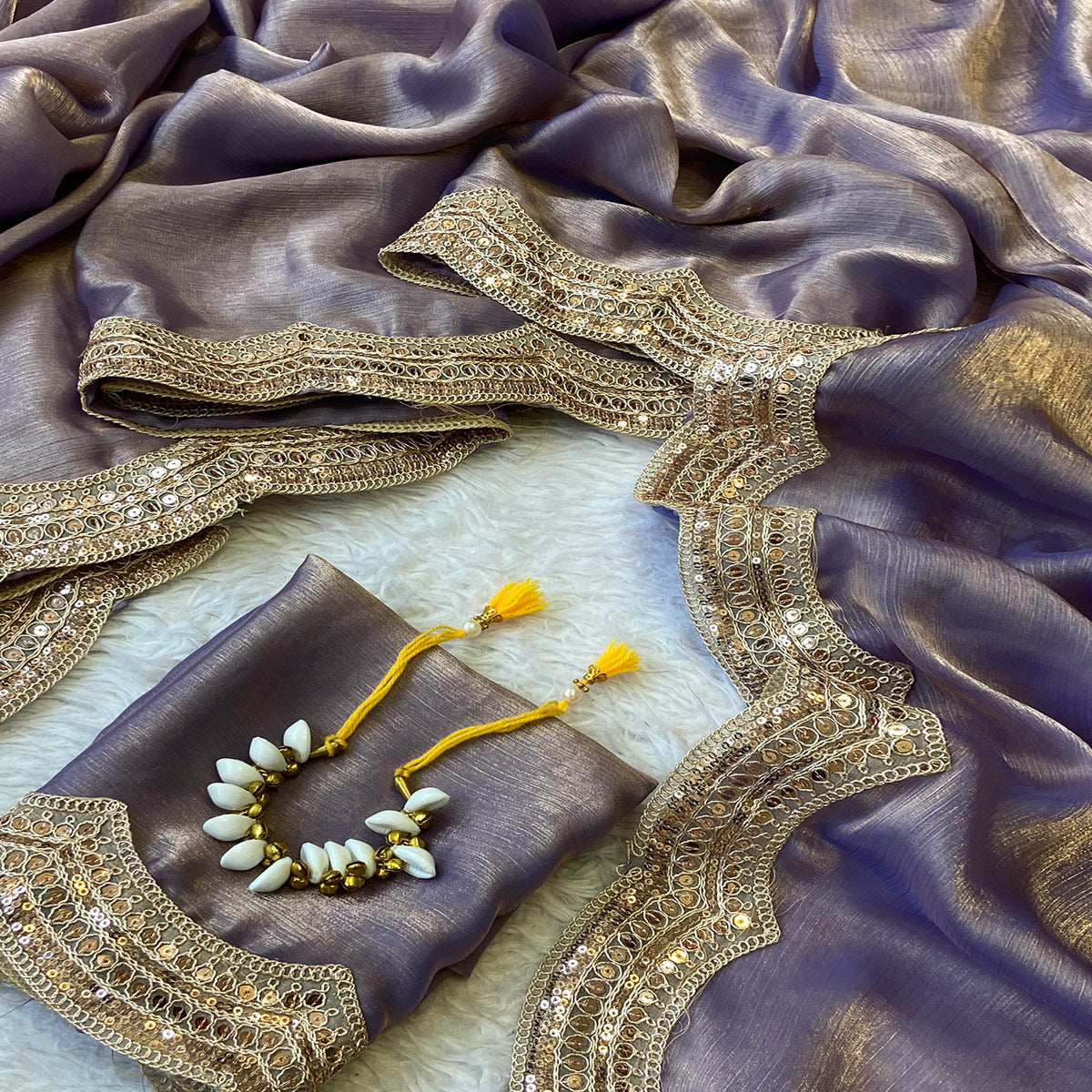 Lavender Solid Chiffon Saree Accented with Embellished Border