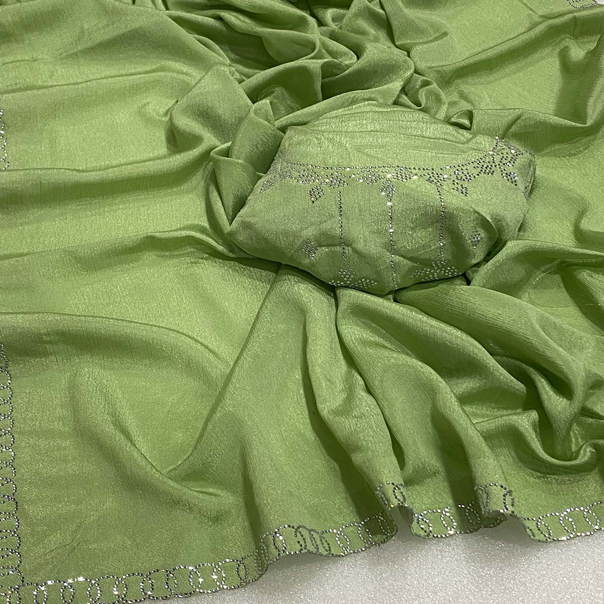Green Embellished Silk Blend Saree Featuring Fine Swarovski Stone Detailing