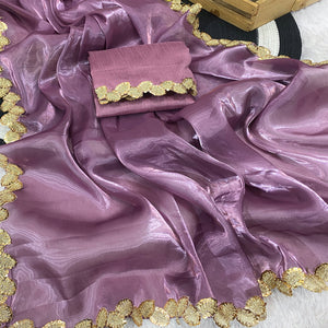 Purple Tissue Saree Featuring Solid Finish and Delicate Lace Work by Jimmy Choo Style
