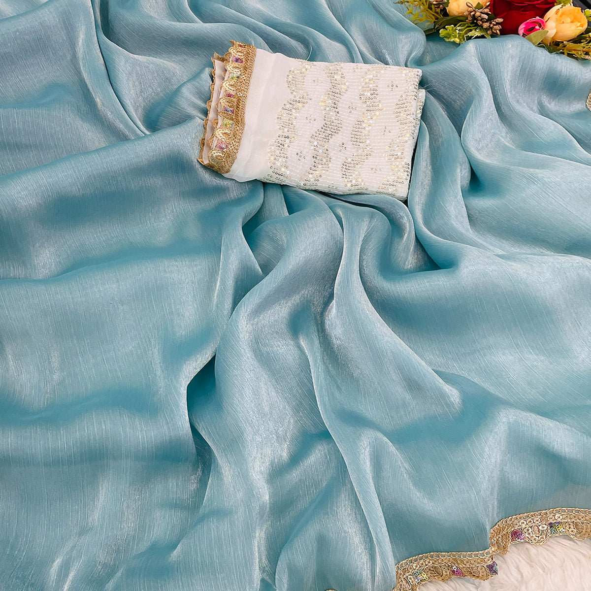 Turquoise Solid Satin Burberry Saree With Sparkling Sequins Embroidered Lace Border