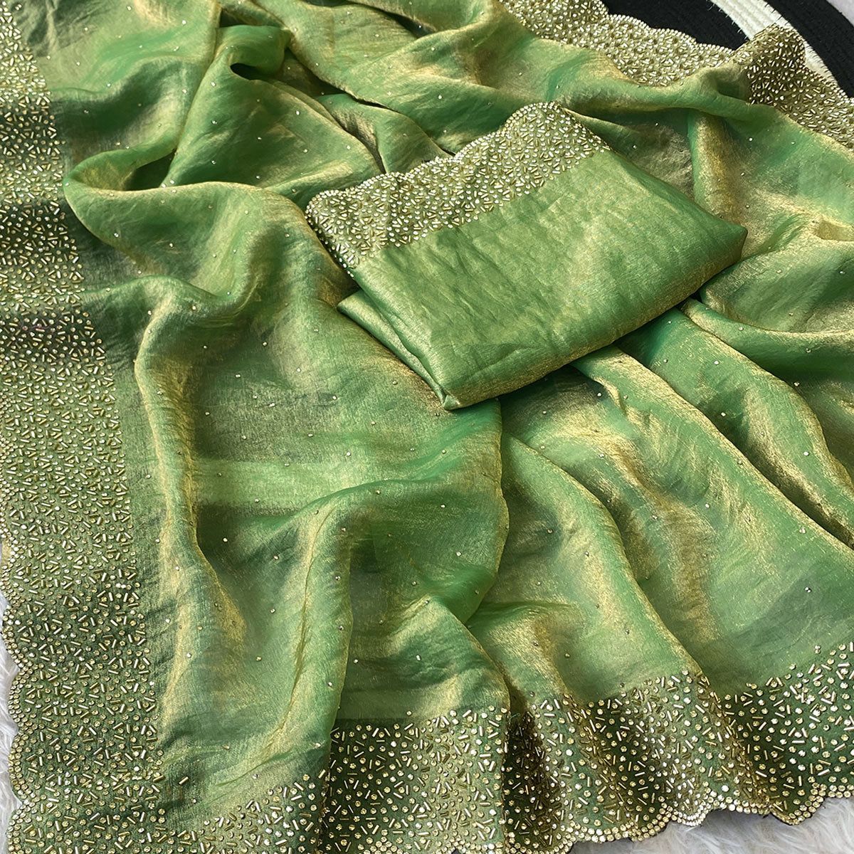 Green Fandy Satin Saree Featuring Intricate Swarovski Work & Decorative Zarkan Border