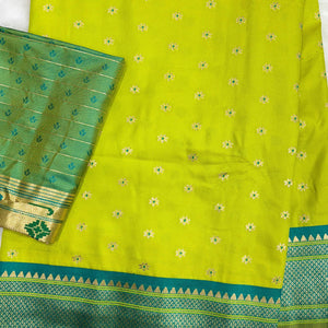 Graceful Green Silk Blend Saree Adorned With Intricate Floral Zari Weaving