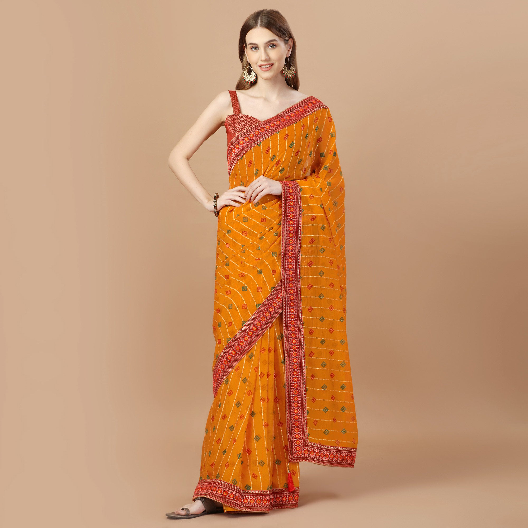 Orange Foil Printed Chiffon Saree With Lace Border