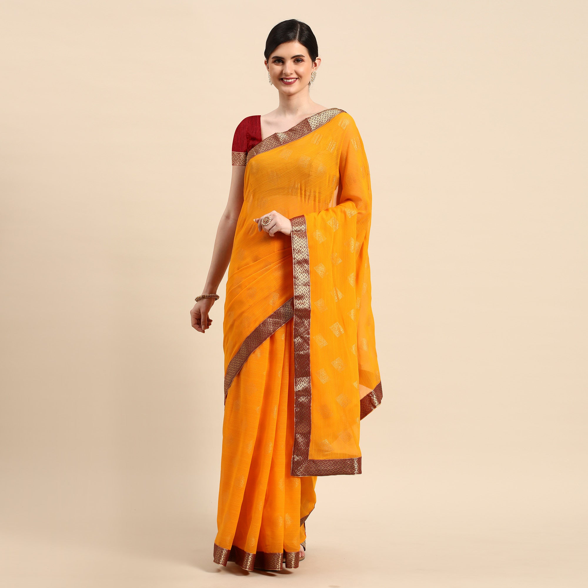 Yellow Foil Printed Chiffon Saree With Tassels