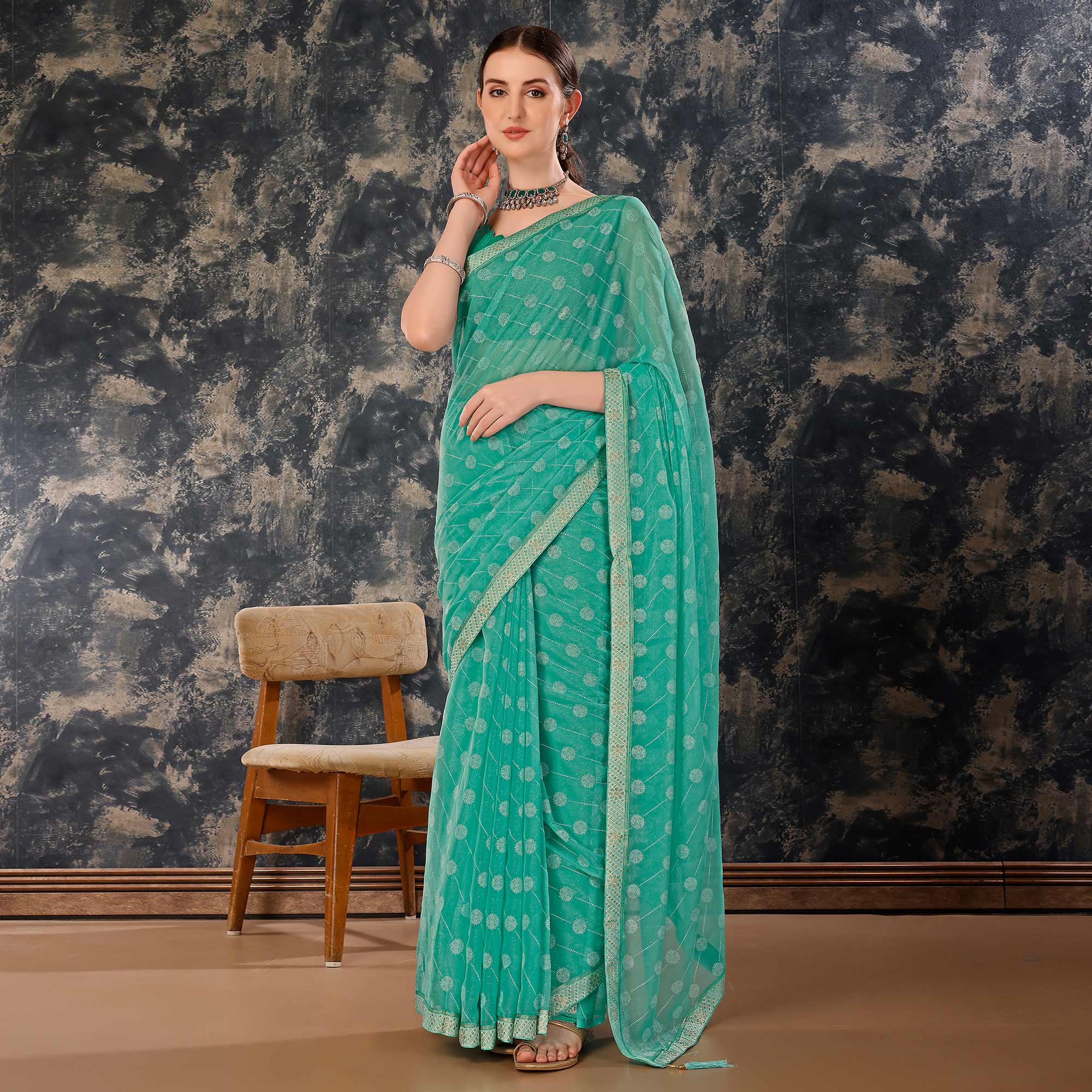 Turquoise Printed Chiffon Saree With Lace Border