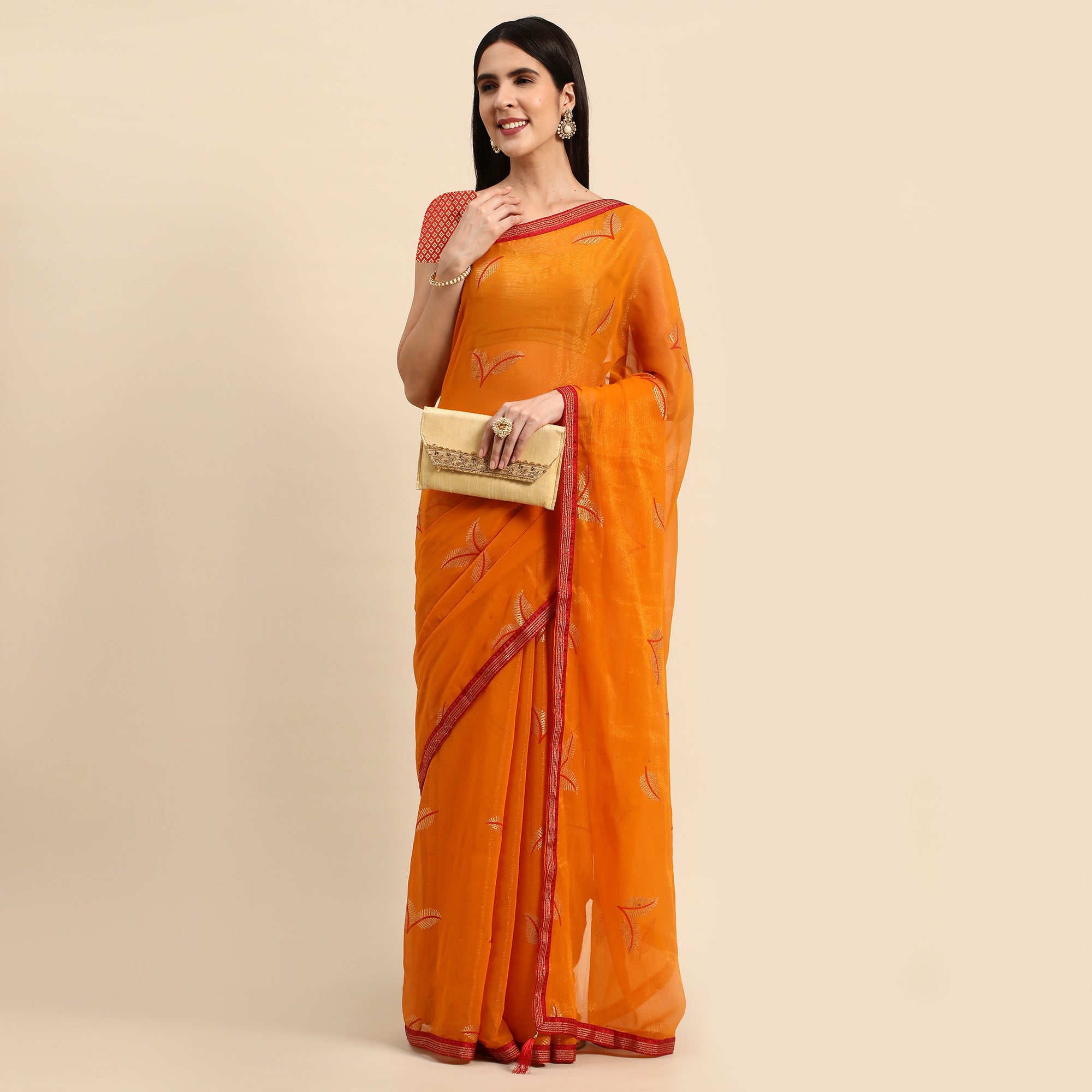 Orange Sequins Embroidered Chiffon Saree With Tassels