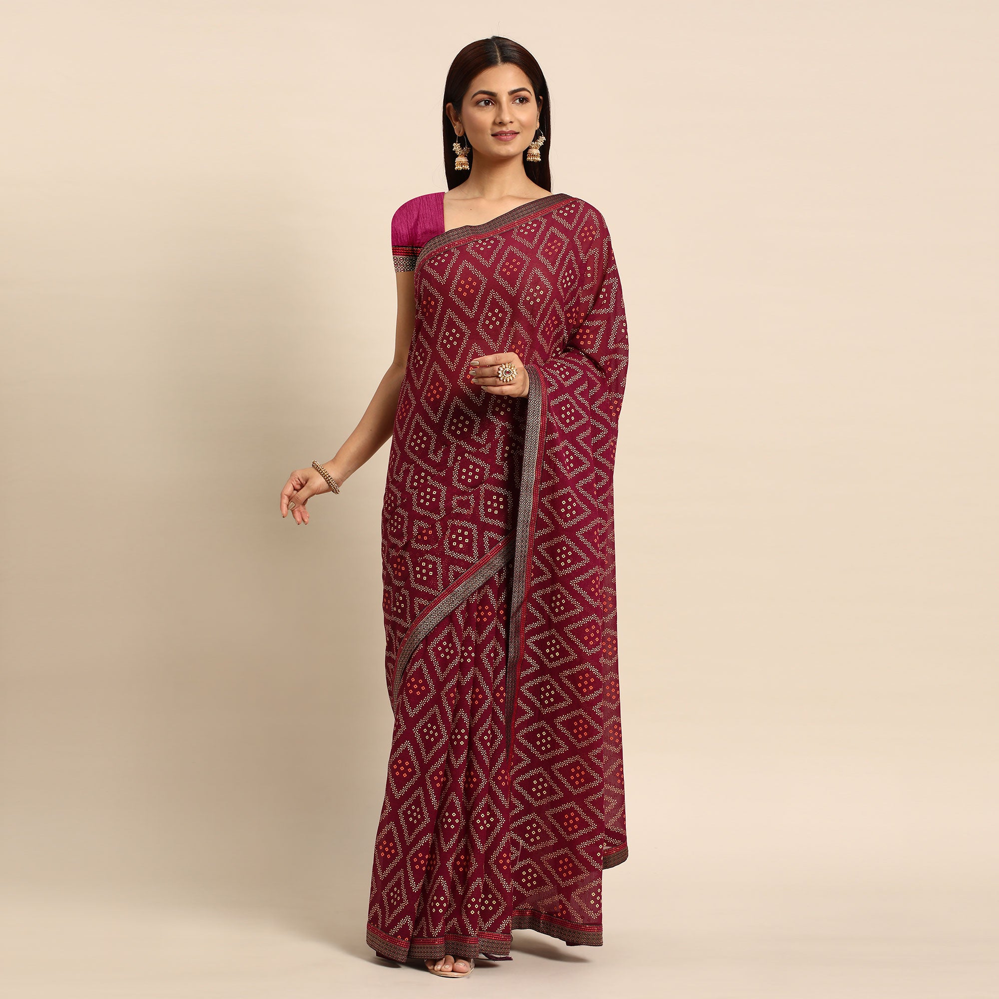 Wine Floral Foil Printed Chiffon Saree With Tassels