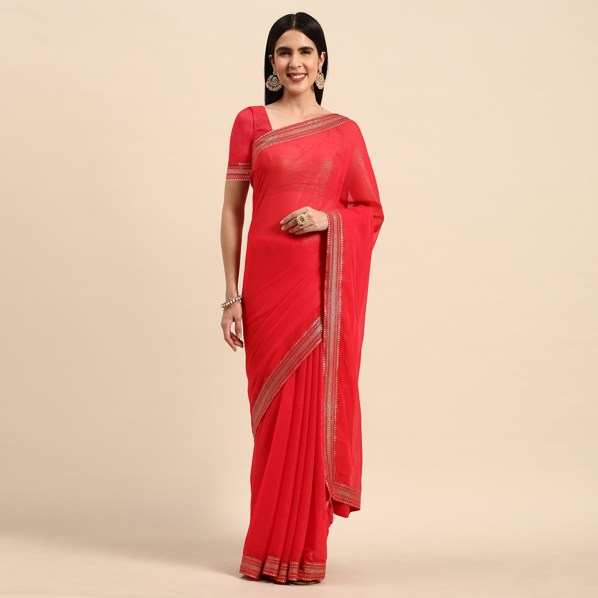 Pink Solid With Woven Border Chiffon Saree With Tassels