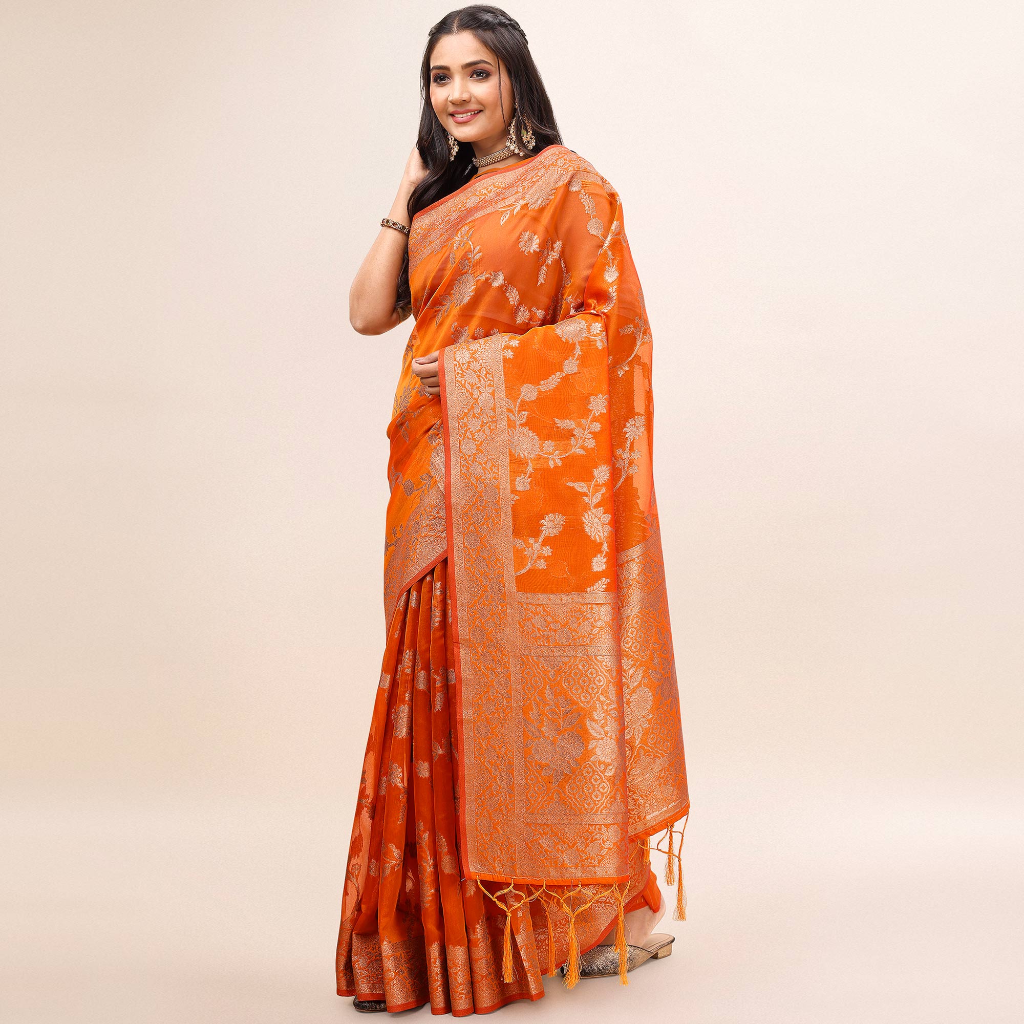 Orange Woven Organza Saree With Tassels