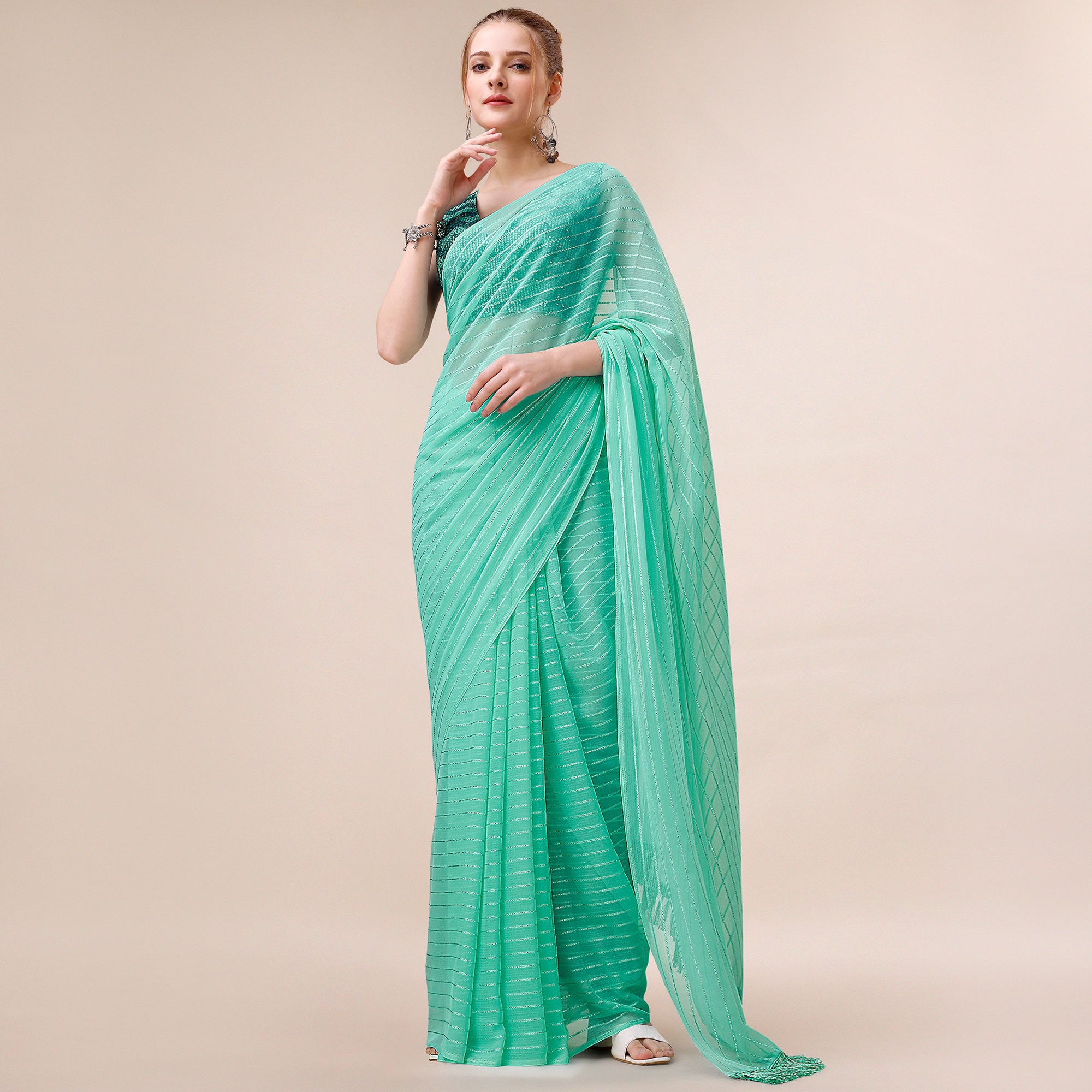 Turquoise Embroidered Georgette Saree