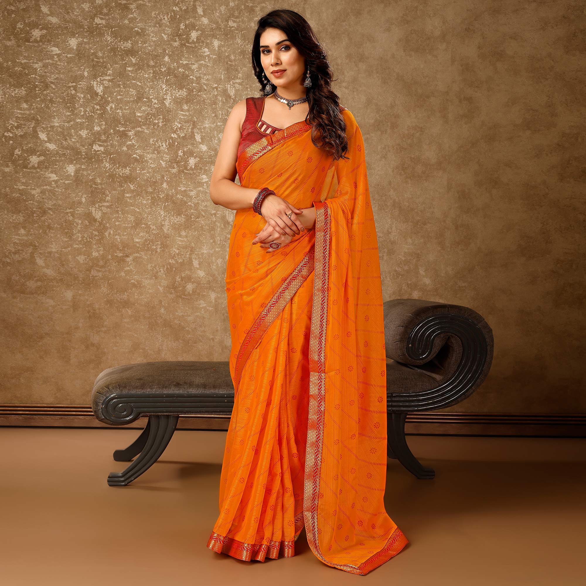 Orange Floral Foil Printed Chiffon Saree With Lace Border