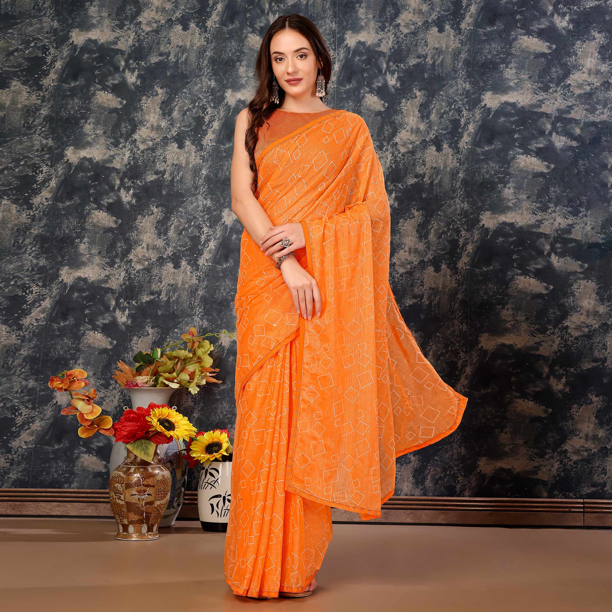 Orange Printed With Zari Work Chiffon Saree With Lace Border