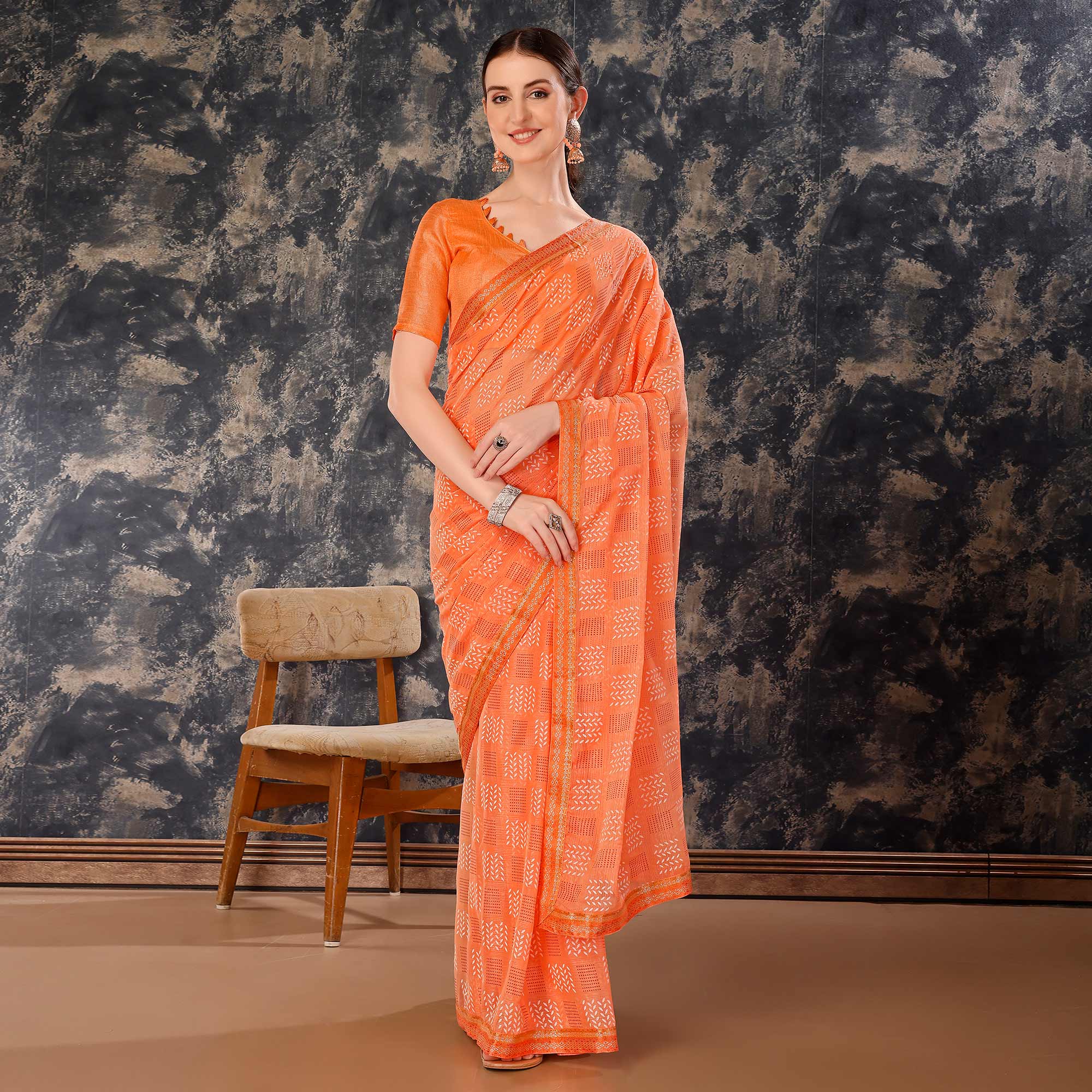 Light Orange Printed Chiffon Saree With Lace Border