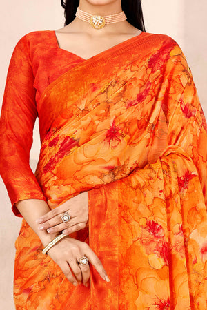 Orange Chiffon Saree With Delicate Floral Prints & Elegant Woven Border
