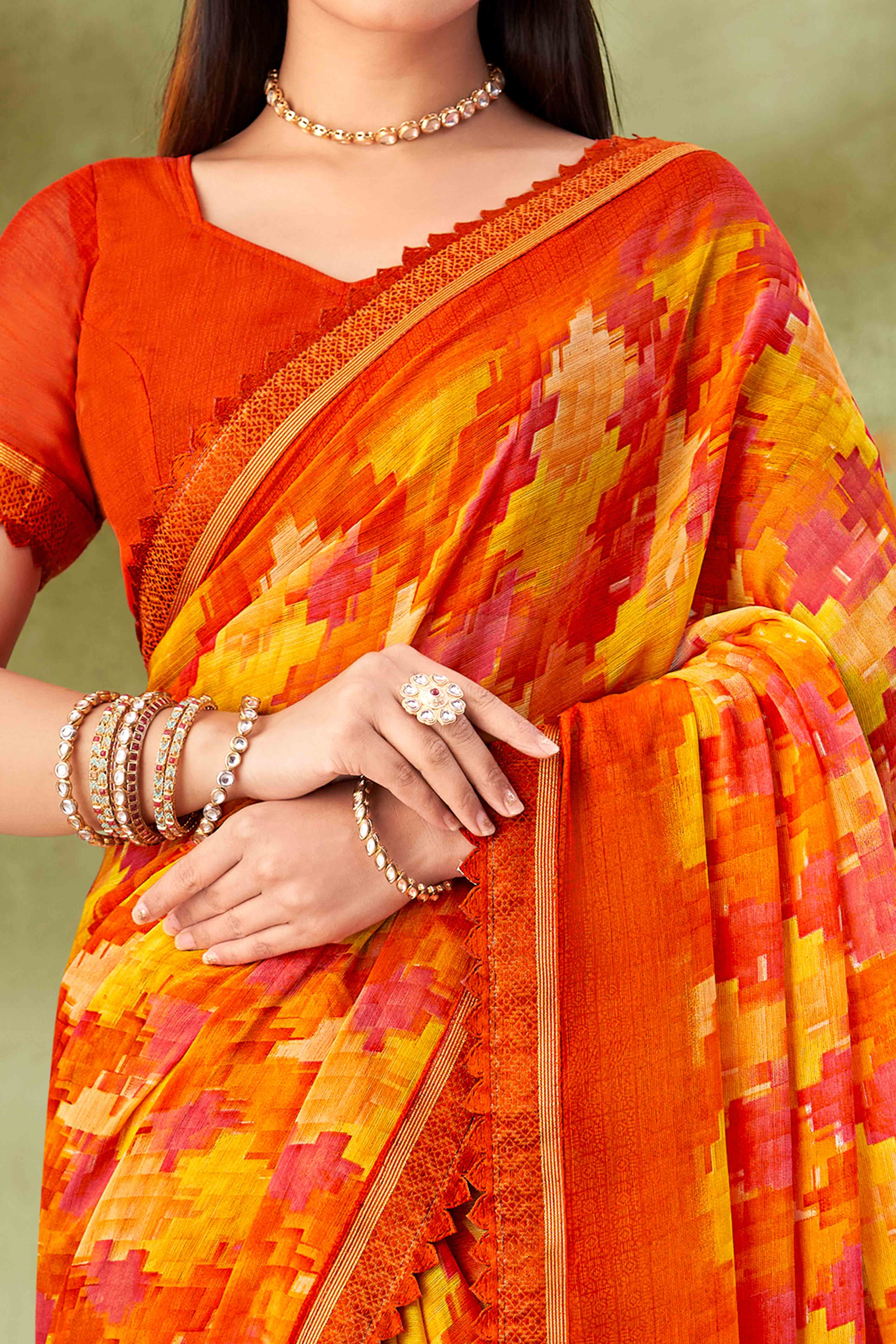 Orange Digital Printed Chiffon Saree Accented With Elegant Lace Border