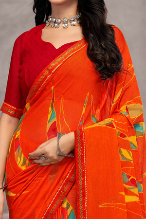Refreshing Orange Chiffon Saree Featuring Digital Print & Graceful Lace Border
