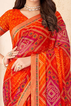 Orange Bandhani Printed Chiffon Saree Enhanced with Delicate Lace Border Work