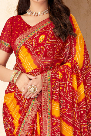 Red & Mustard Bandhani Printed Chiffon Saree Enhanced with Delicate Lace Border Work