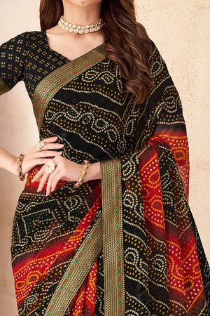 Black & Red Bandhani Printed Chiffon Saree Enhanced with Delicate Lace Border Work