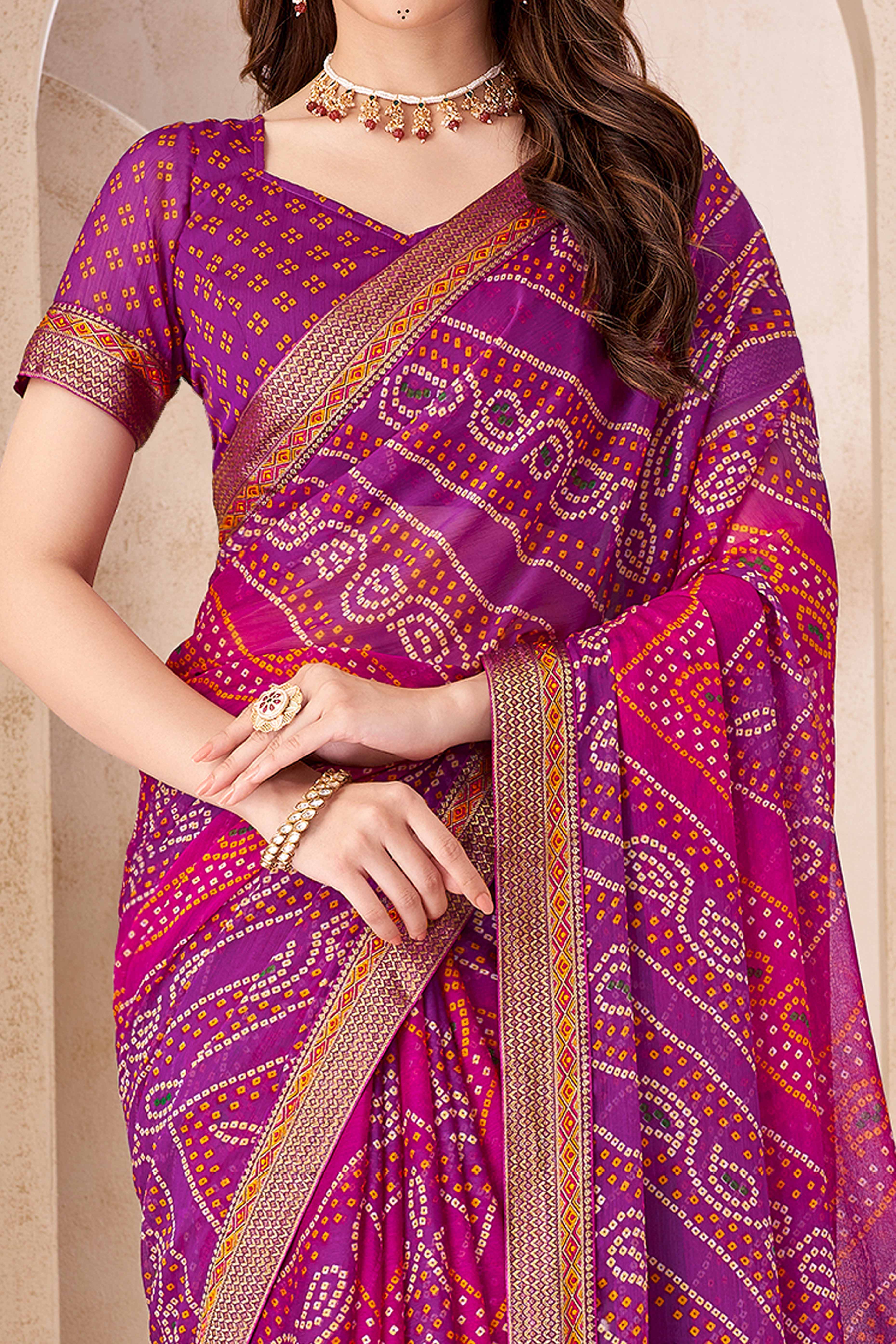 Purple Bandhani Printed Chiffon Saree Enhanced with Delicate Lace Border Work