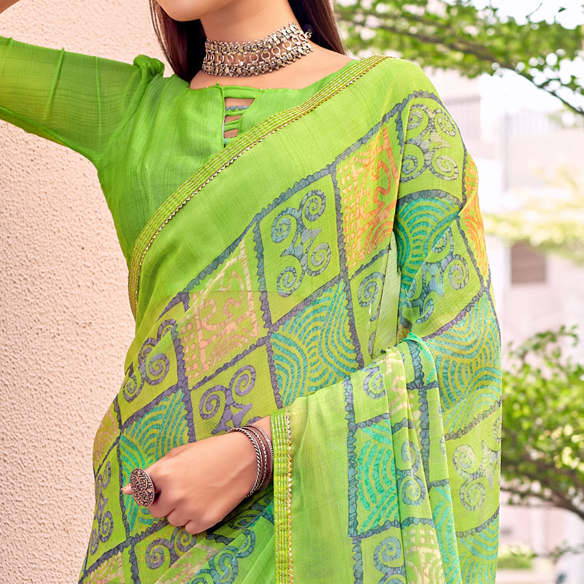 Green Printed Chiffon Saree With Tassels