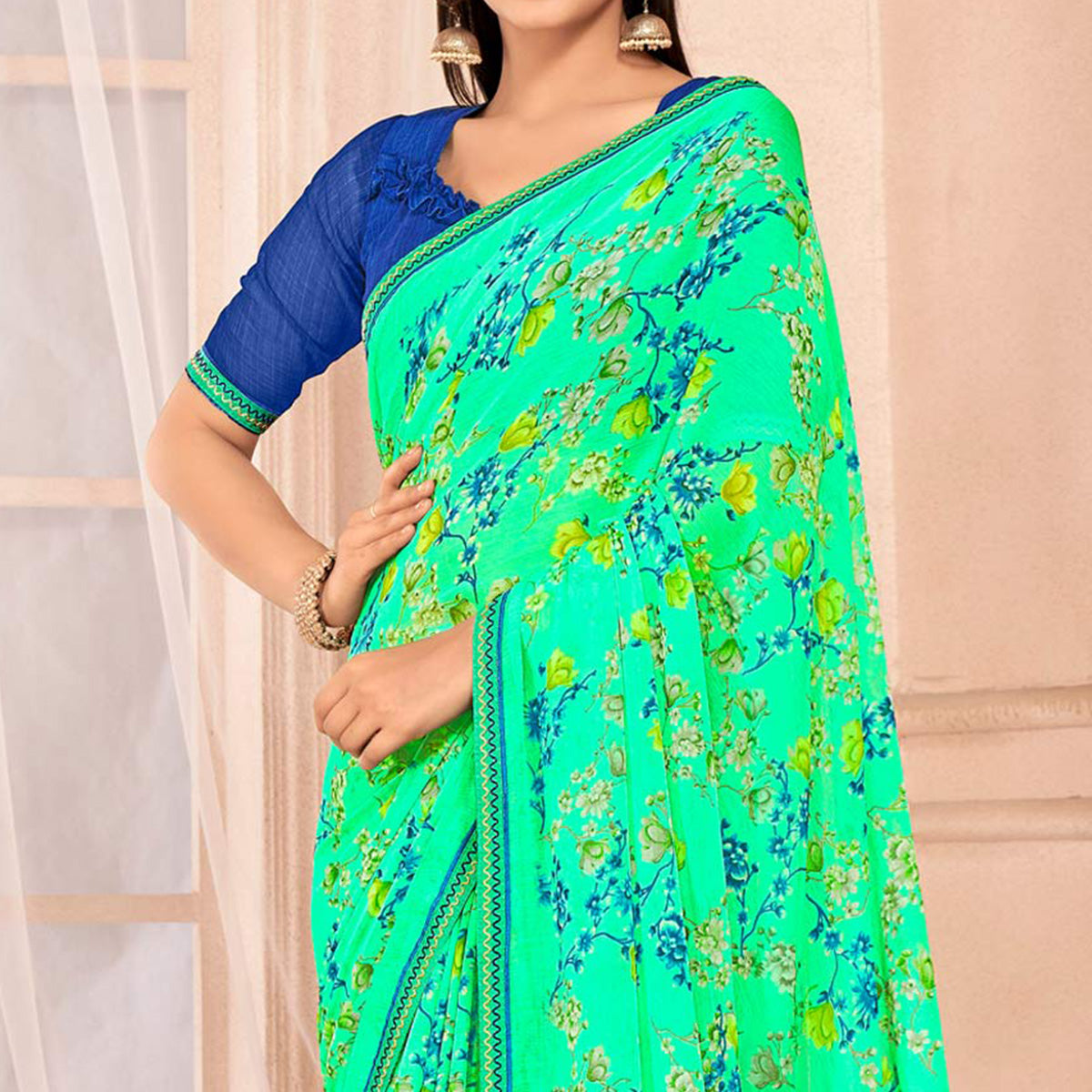 Mint Green Floral Printed Chiffon Saree With Lace Border