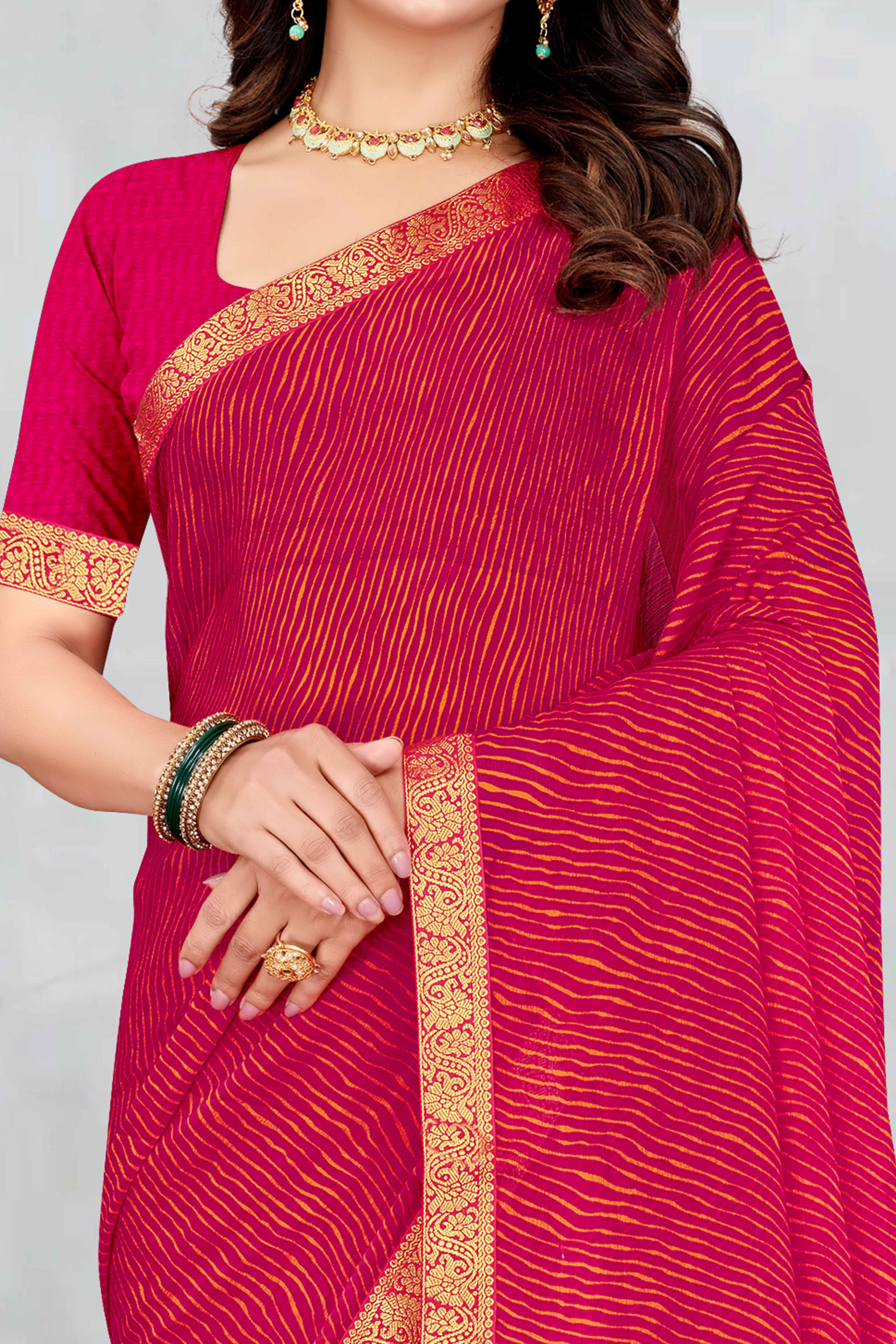 Pink Leheriya Printed Chiffon Saree Accented With A Graceful Floral Weaving Lace Border