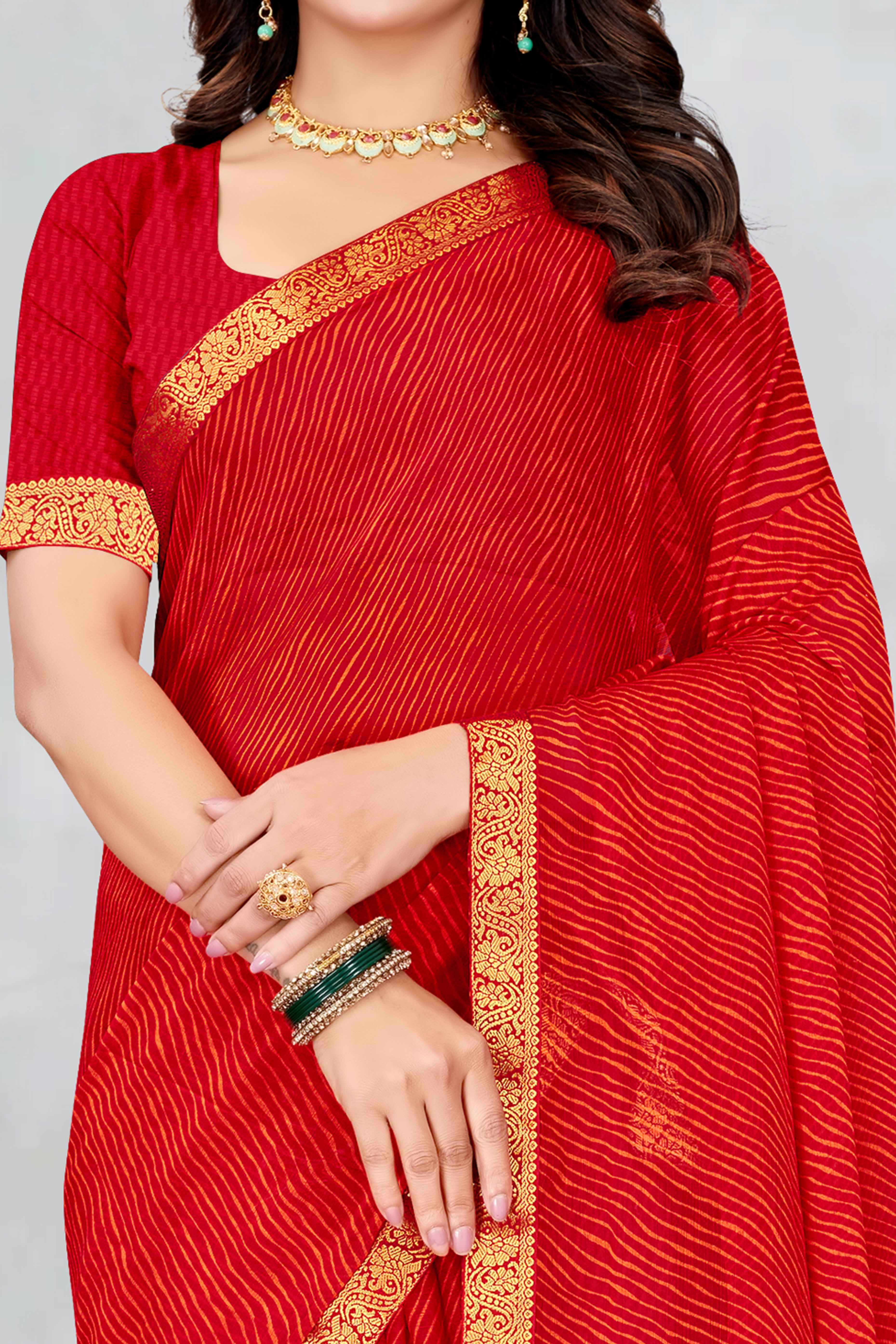 Red Leheriya Printed Chiffon Saree Accented With A Graceful Floral Weaving Lace Border
