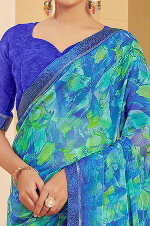 Blue Chiffon Saree Adorned With Artistic Floral Print & Finely Crafted Woven Lace Border