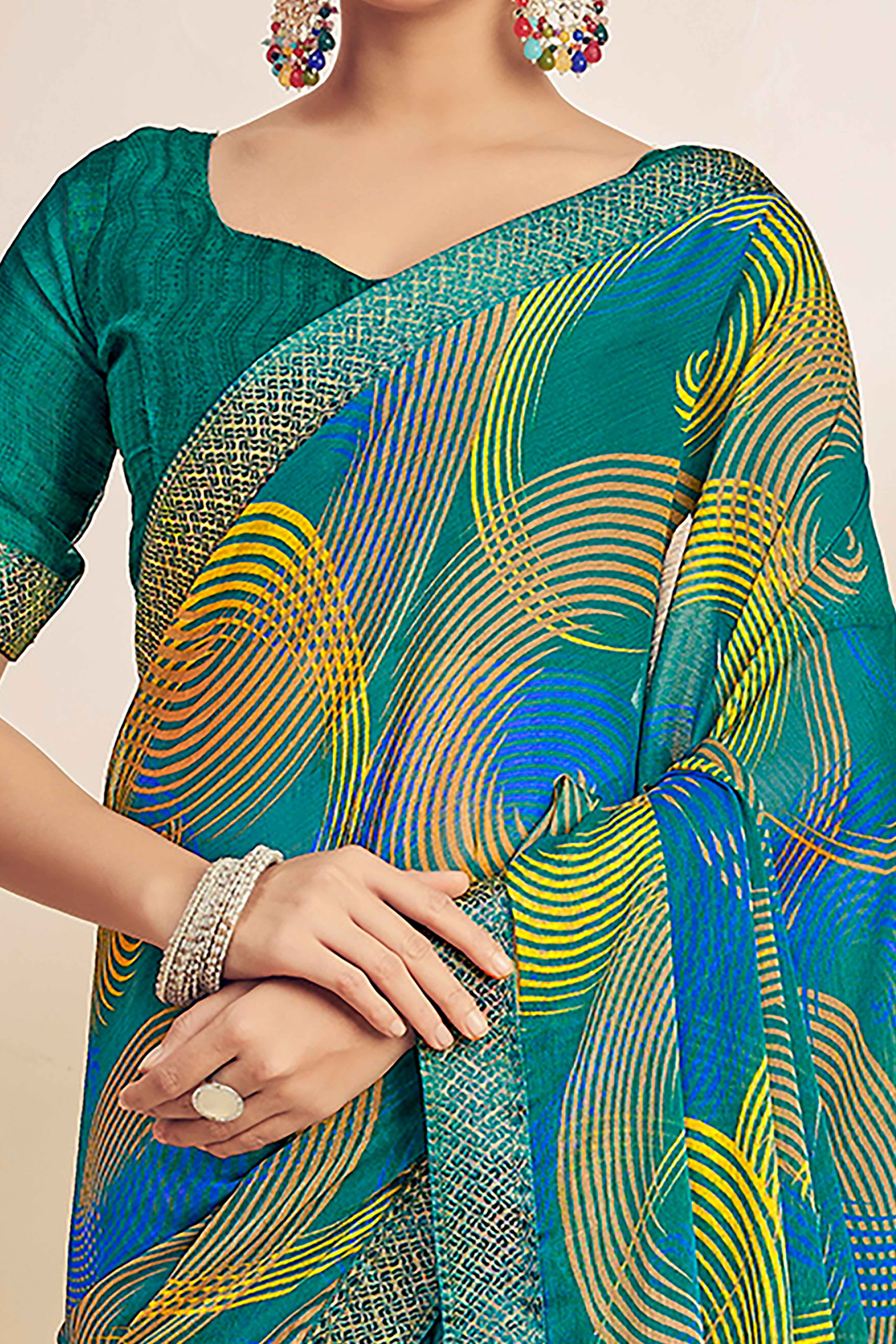 Teal Green Chiffon Saree Adorned With Artistic Print & Finely Crafted Woven Lace Border