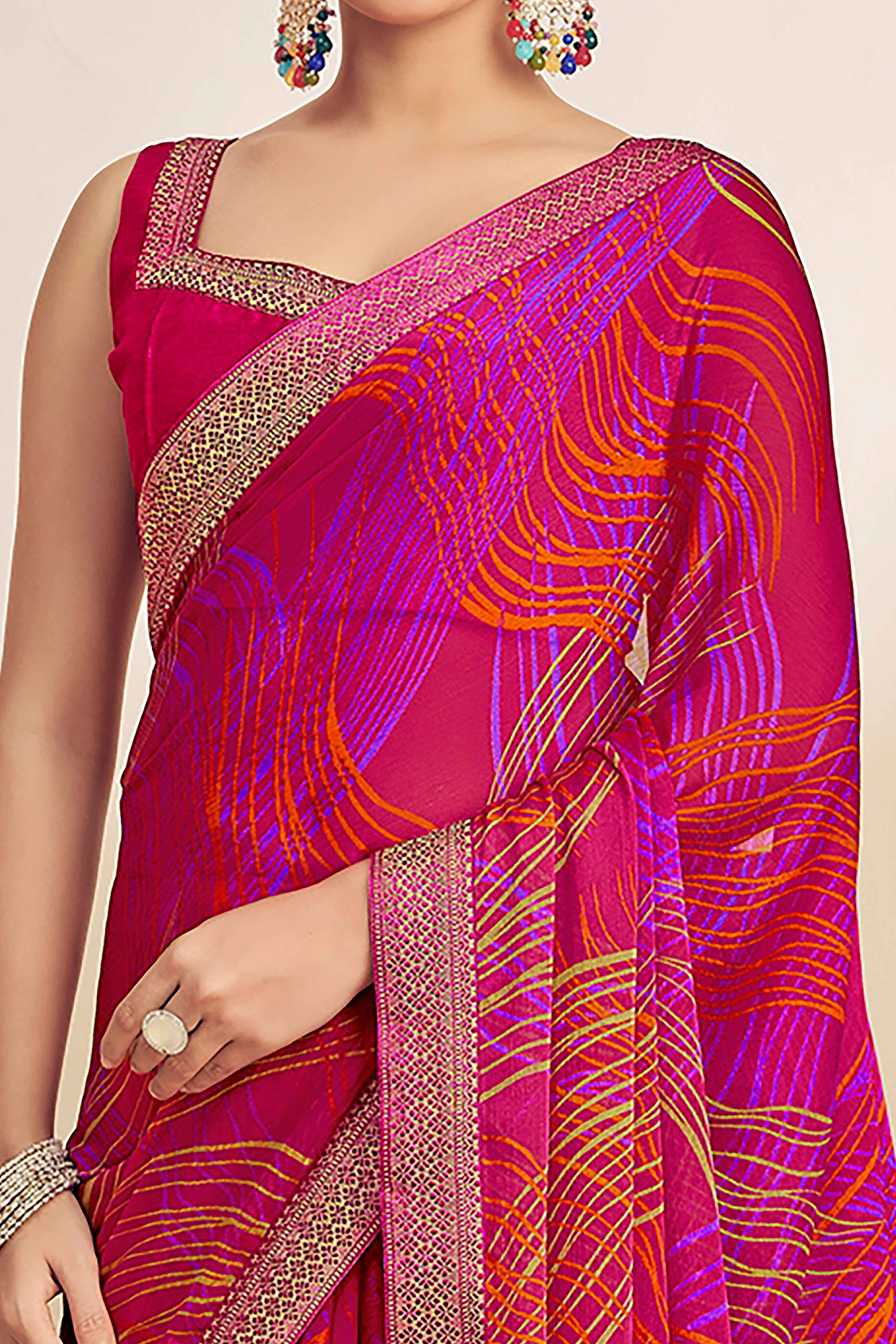 Magenta Chiffon Saree Adorned With Artistic Print & Finely Crafted Woven Lace Border