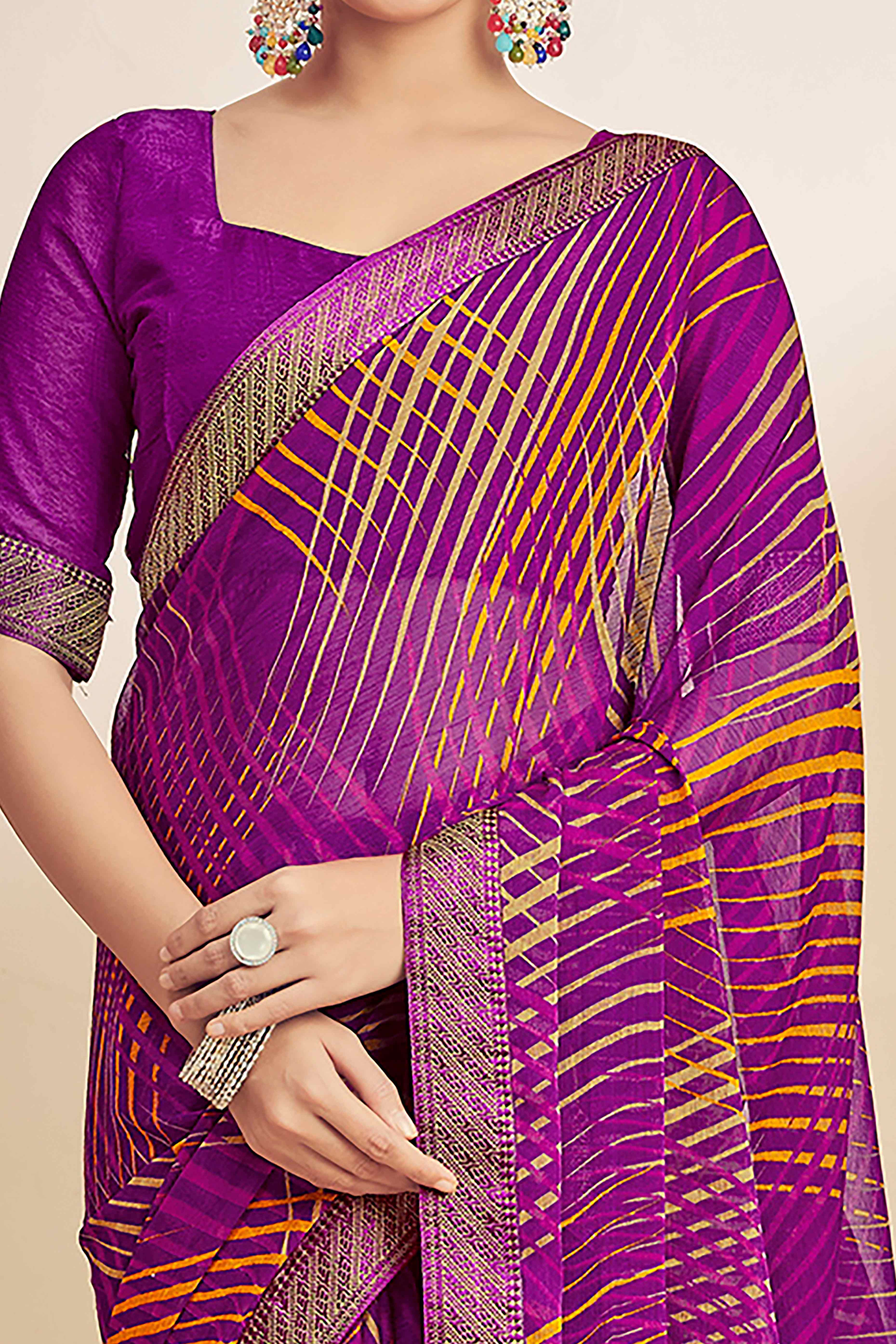 Purple Chiffon Saree Adorned With Artistic Print & Finely Crafted Woven Lace Border