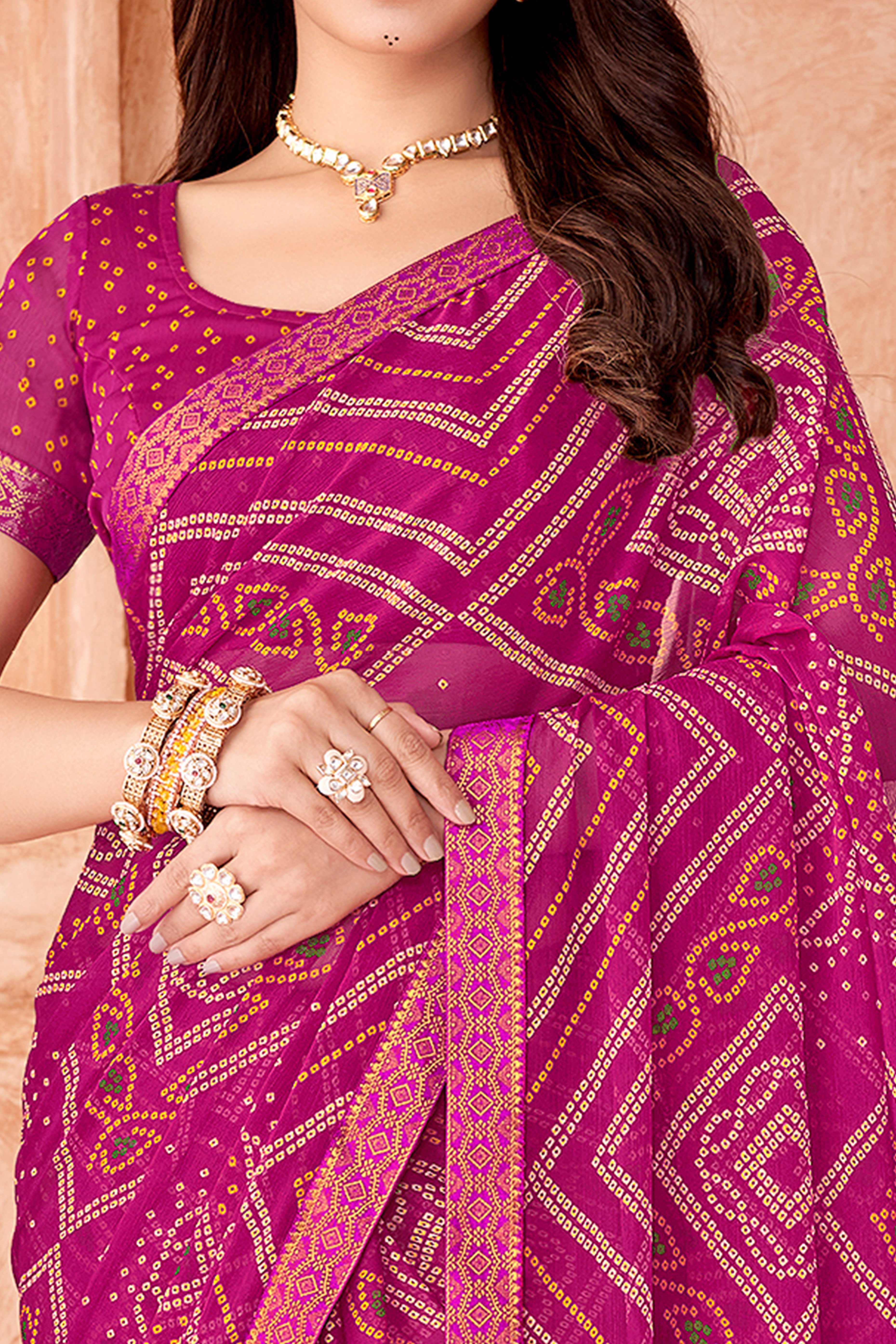 Magenta Chiffon Saree Featuring Traditional Bandhani Prints & A Graceful Lace Edge