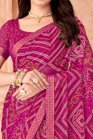 Magenta Chiffon Saree Featuring Traditional Bandhani Prints & A Graceful Lace Edge