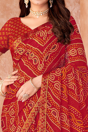 Red Chiffon Saree Featuring Traditional Bandhani Prints & A Graceful Lace Edge