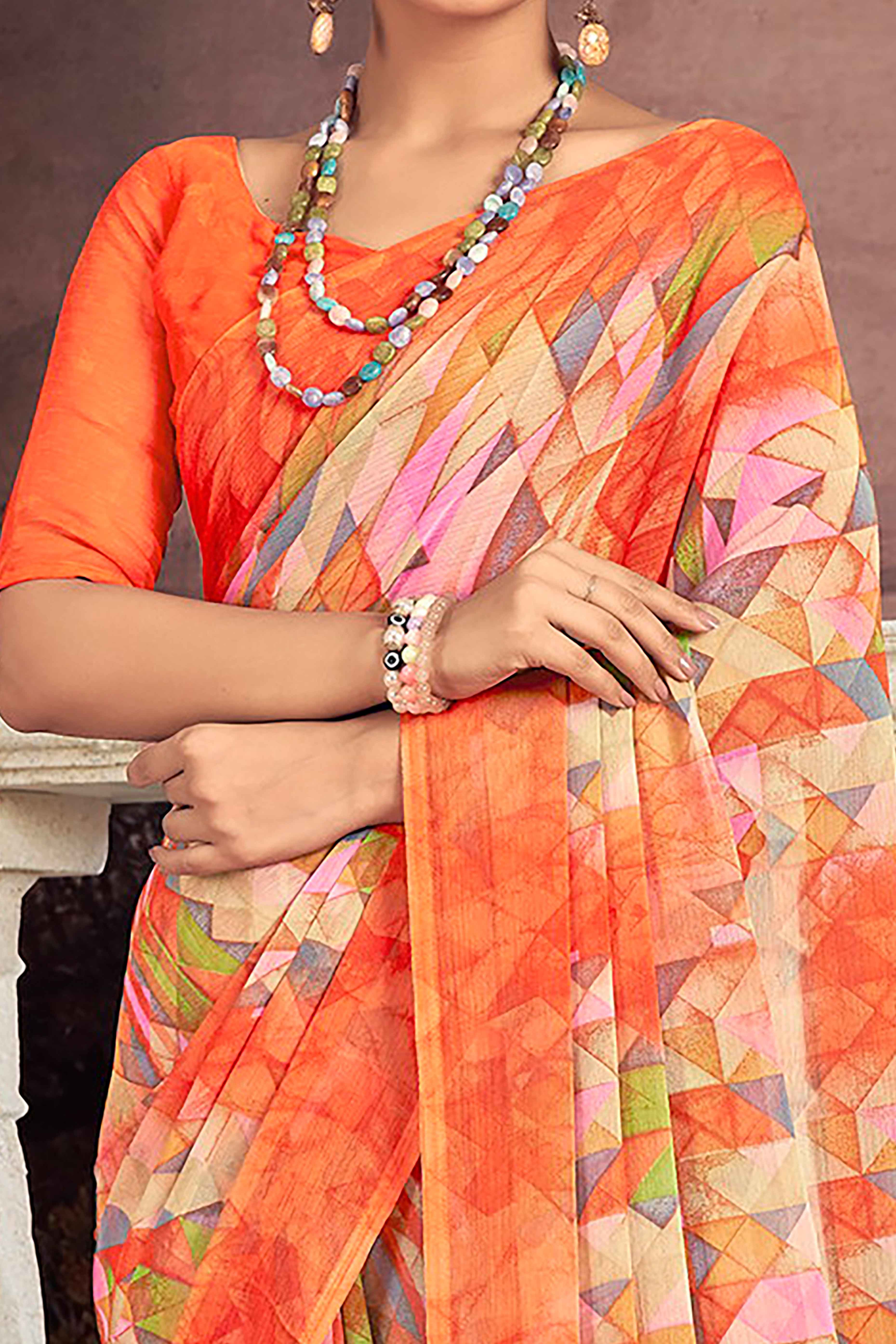 Vibrant Orange Chiffon Saree With Stylish Geometric Print