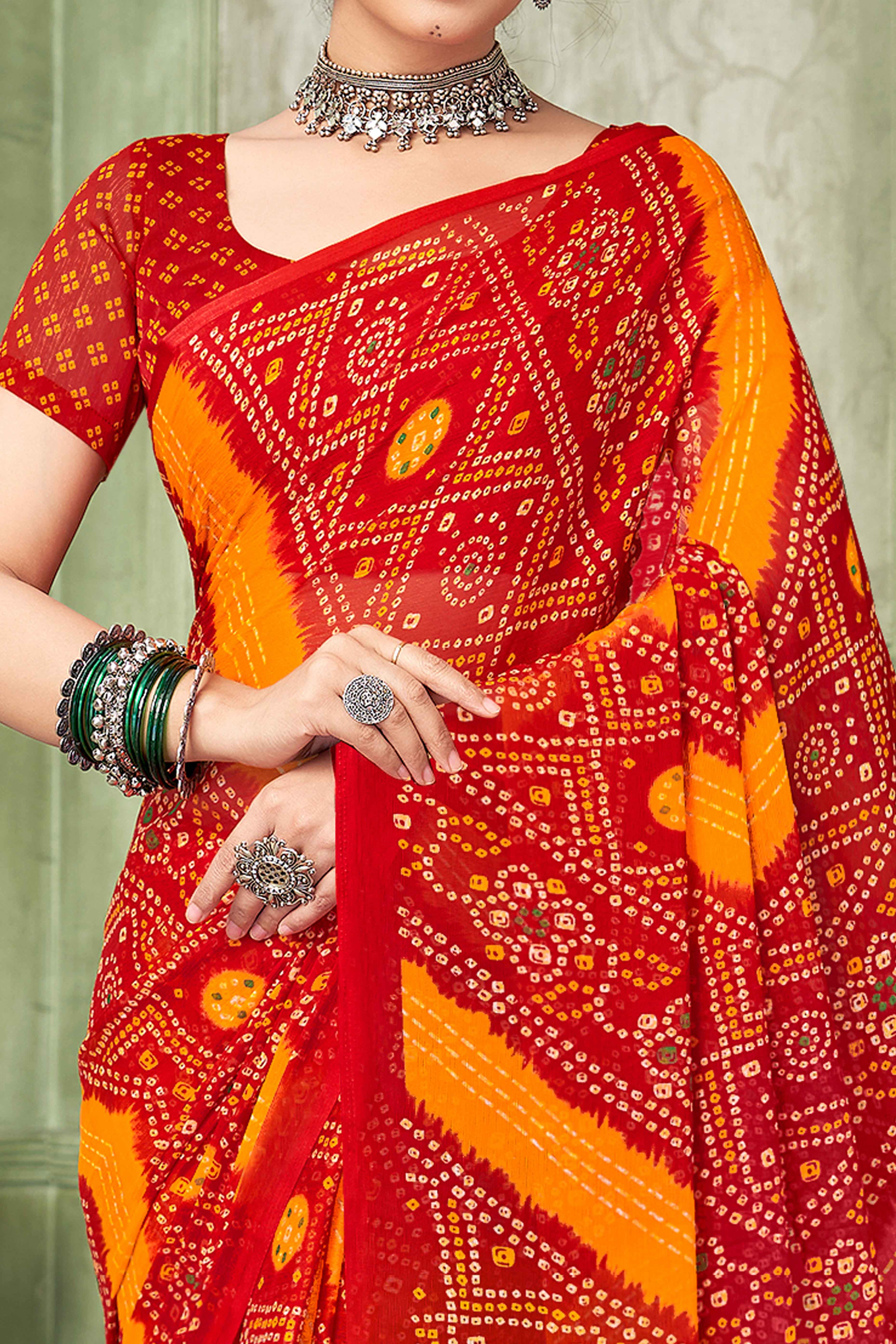 Red Chiffon Saree Adorned With Traditional Bandhani Print