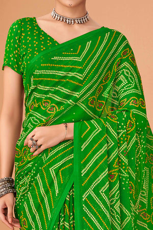 Green Bandhani Printed Chiffon Saree Accented With Intricate Lace Border Work