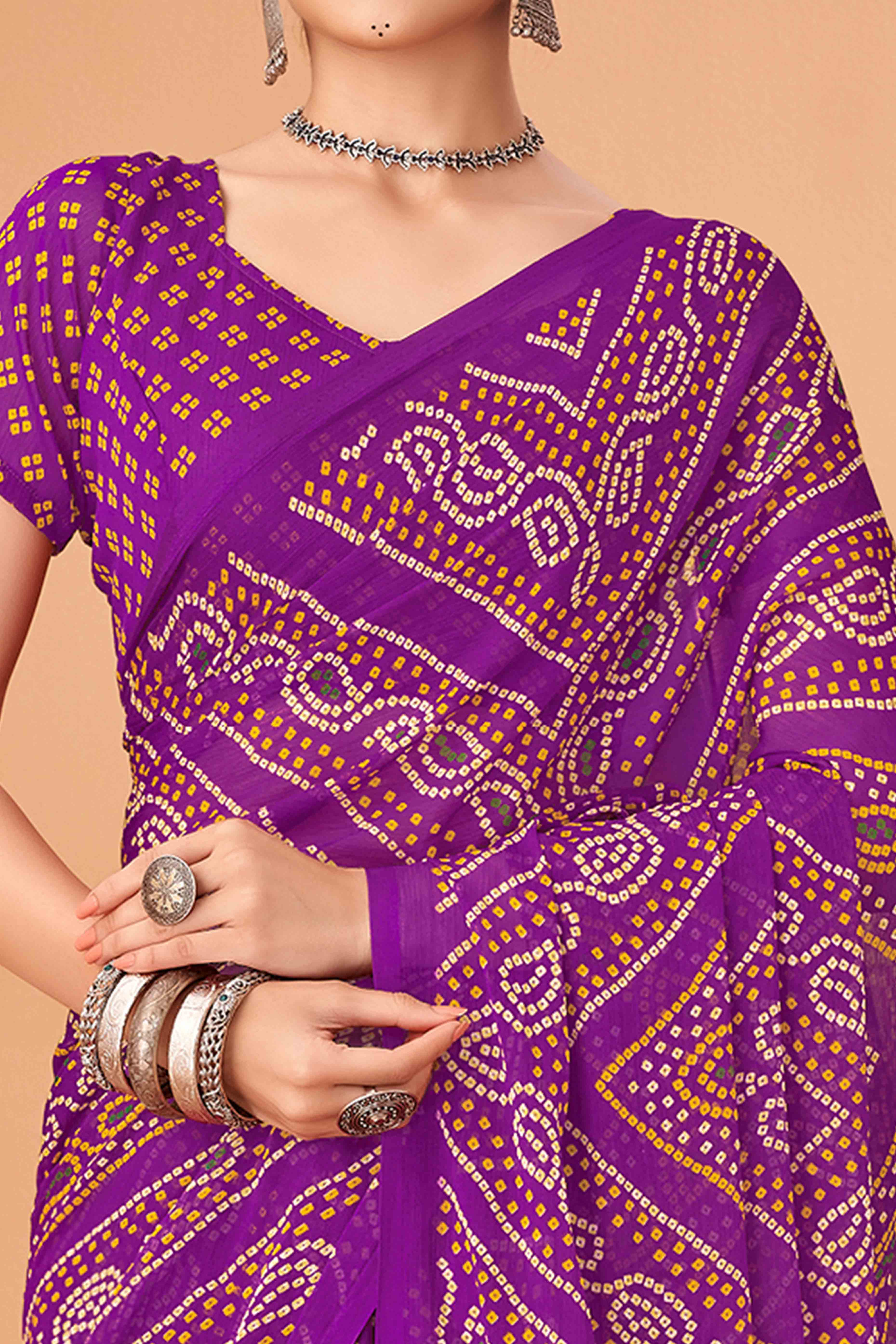 Purple Bandhani Printed Chiffon Saree Accented With Intricate Lace Border Work