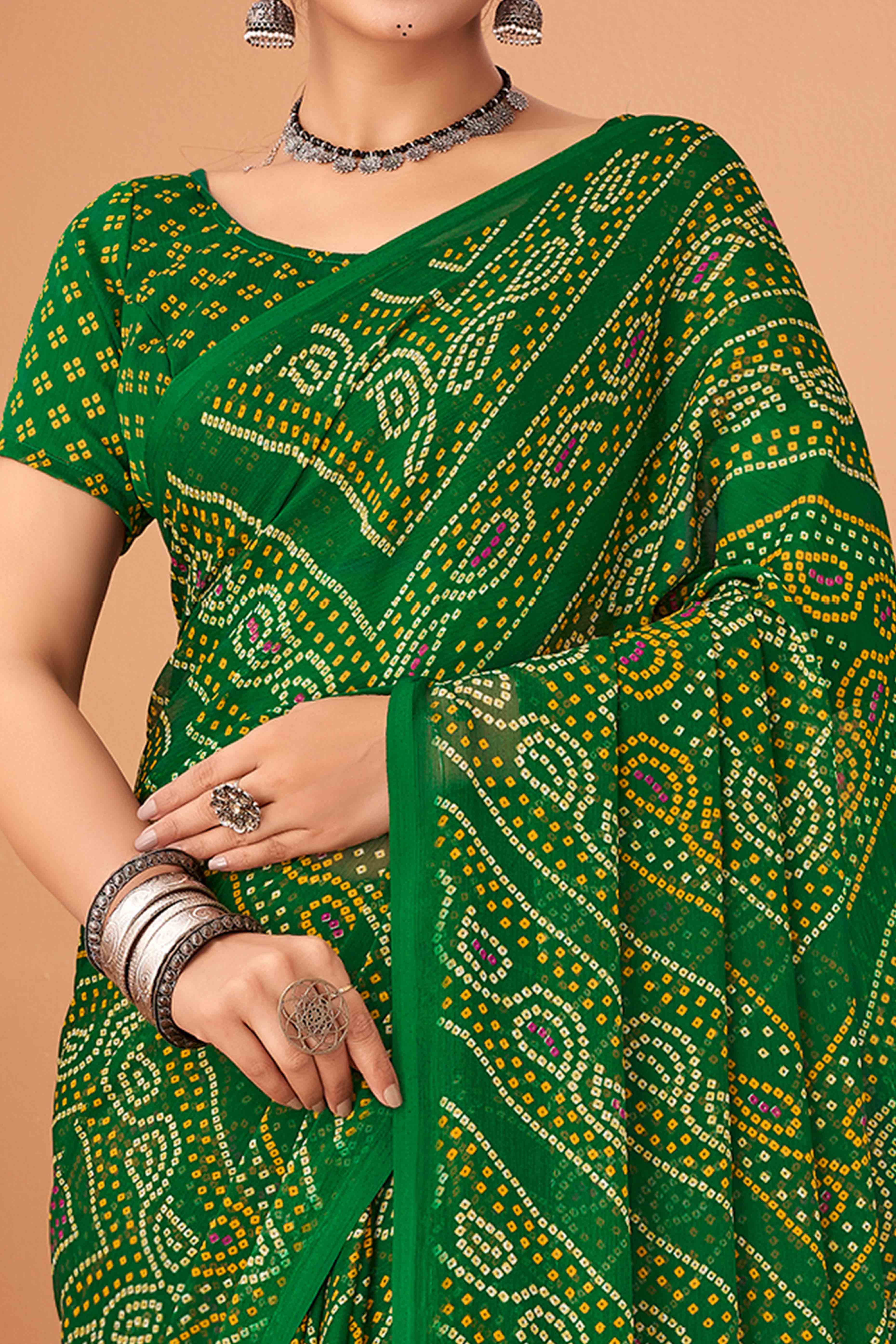 Green Bandhani Printed Chiffon Saree Accented With Intricate Lace Border Work