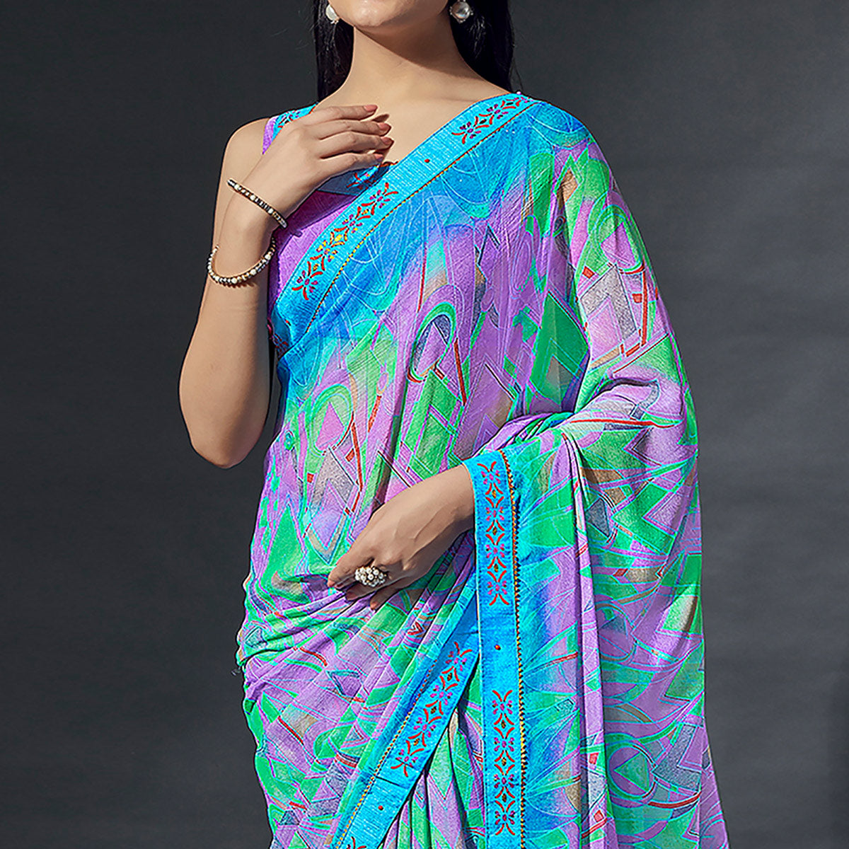 Turquoise Printed Chiffon Saree With Lace Border