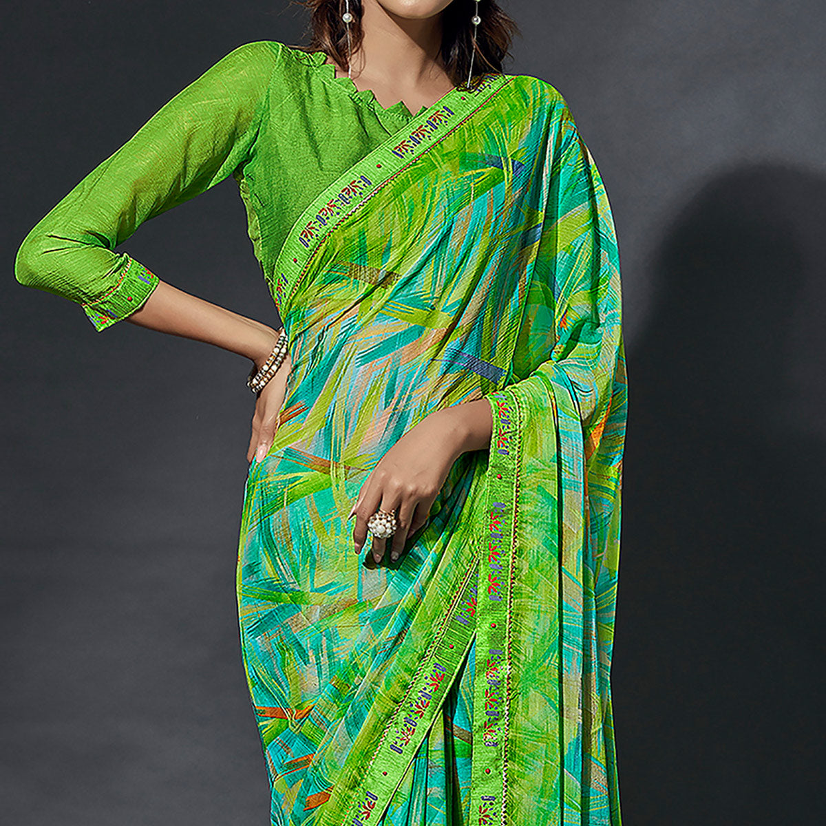 Green Printed Chiffon Saree With Lace Border