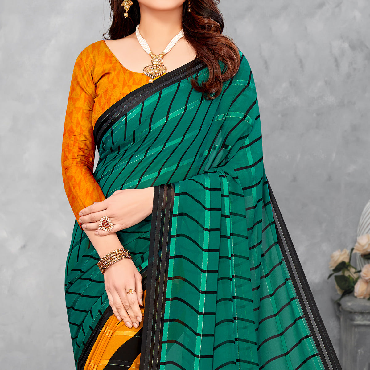Teal & Mustard Striped Printed Georgette Saree