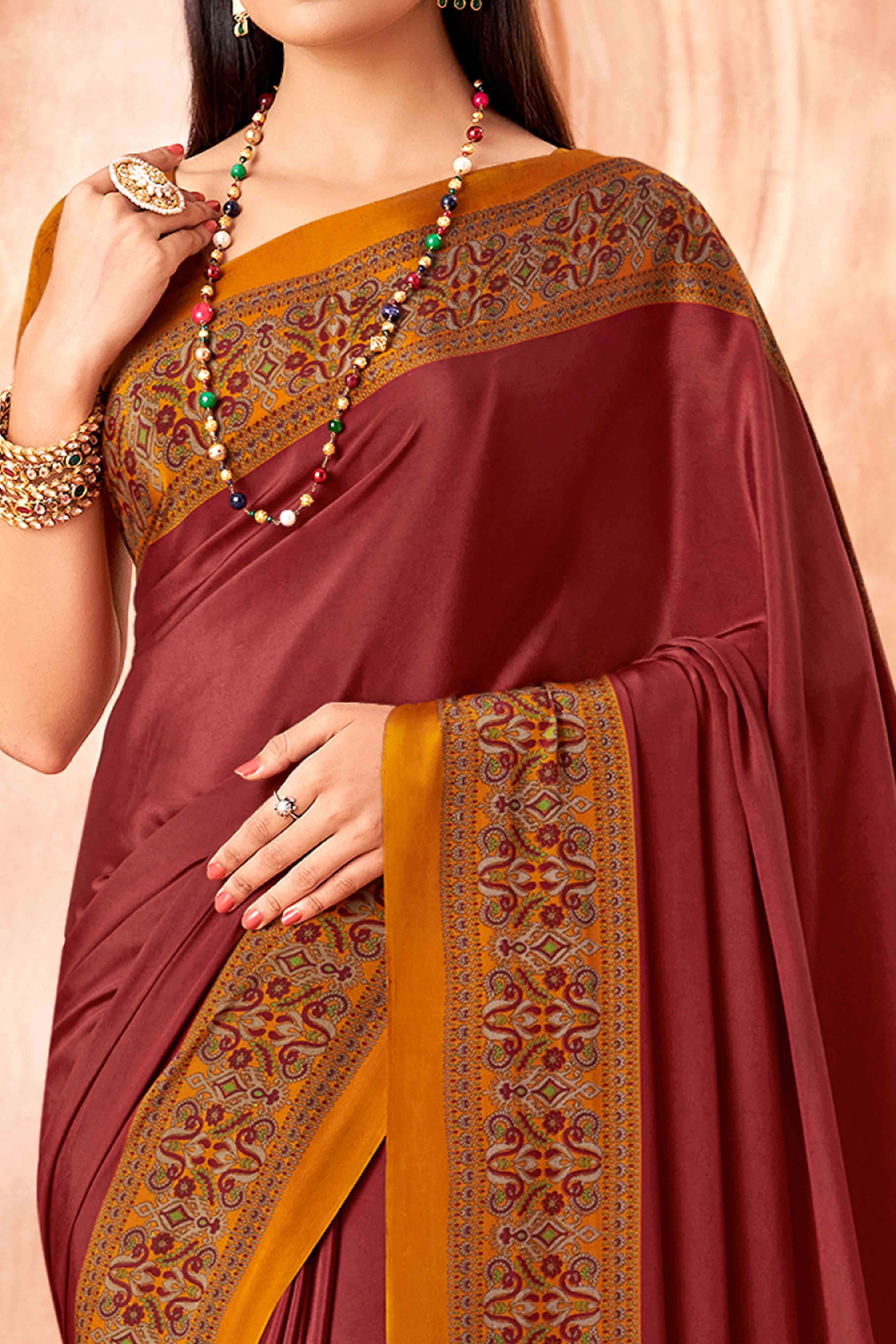 Maroon Crepe Silk Saree with Elegant Floral Print Detailing