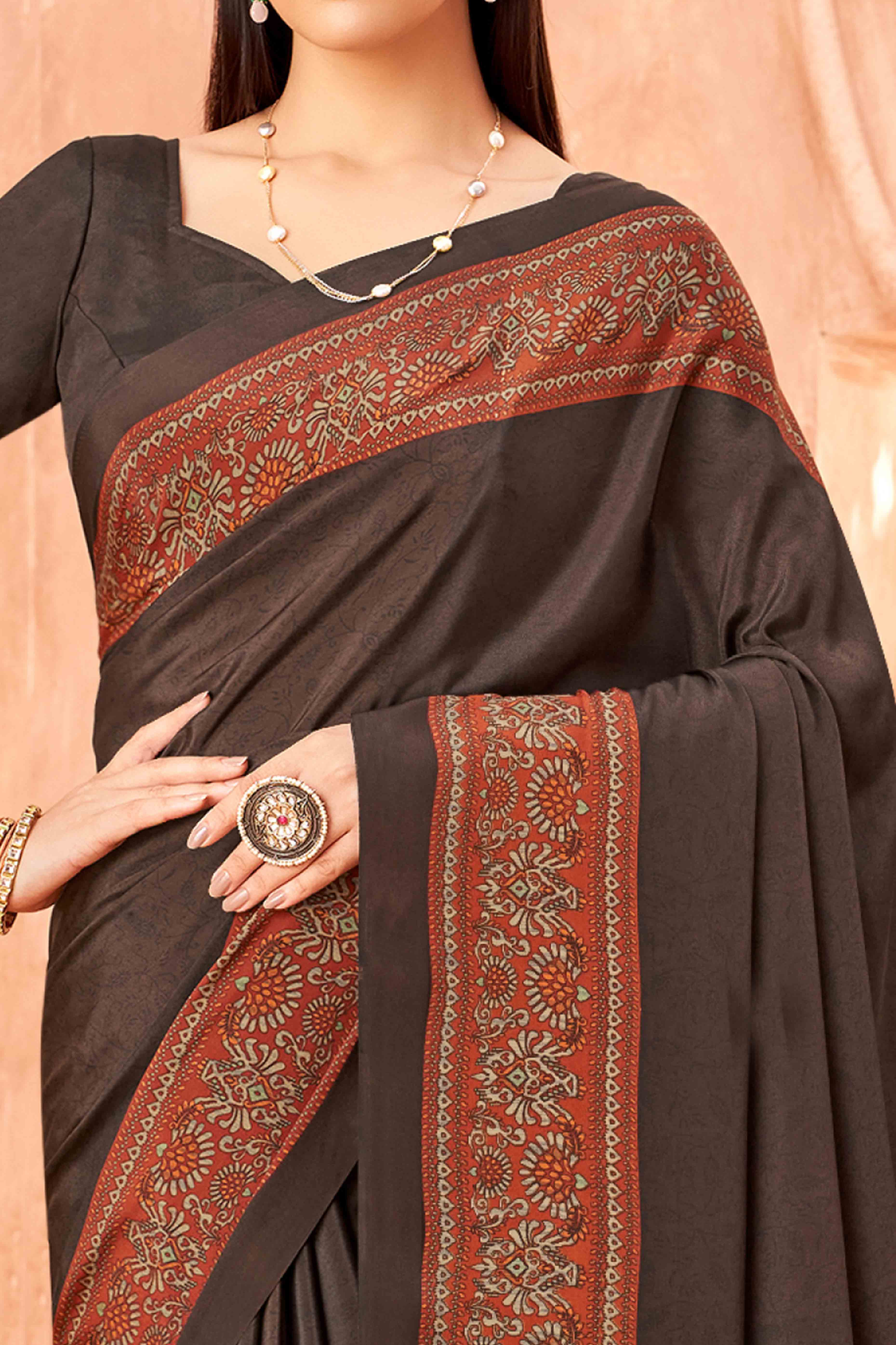 Brown Crepe Silk Saree with Elegant Floral Print Detailing