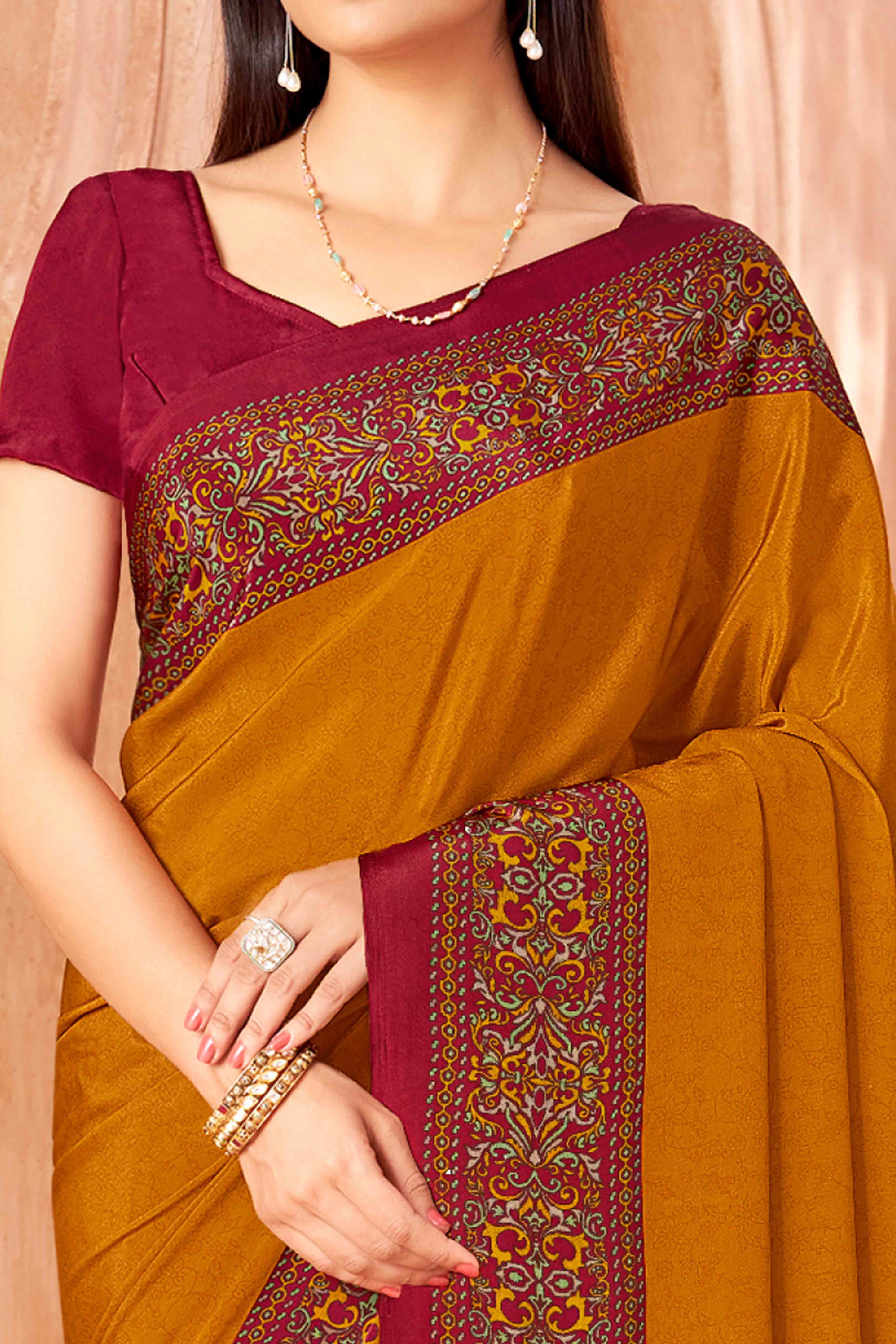 Mustard Crepe Silk Saree with Elegant Floral Print Detailing