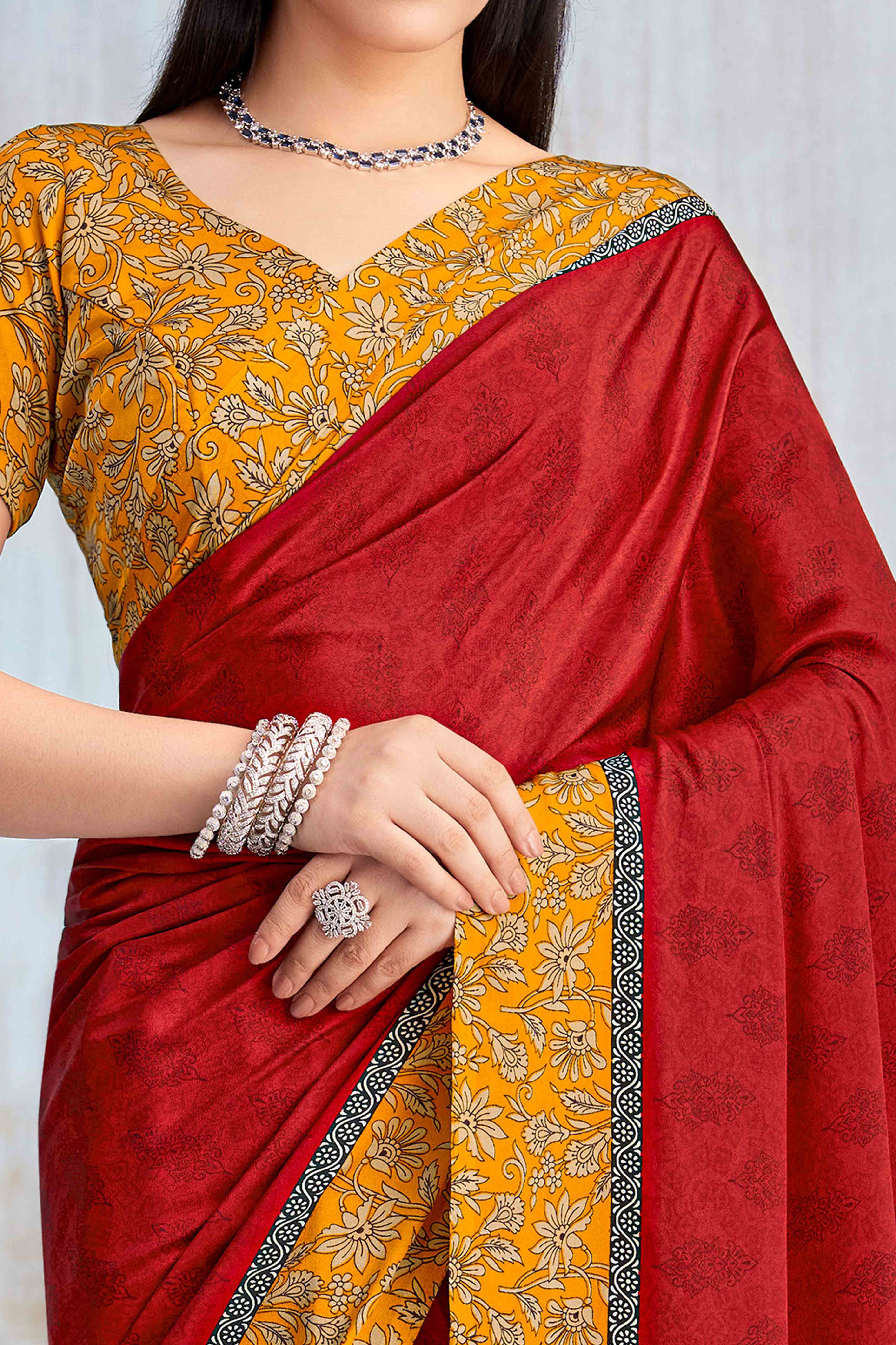 Red Crepe Silk Saree Featuring Delicate Floral Print Work