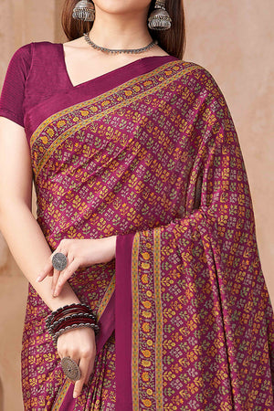 Wine Crepe Silk Saree Featuring Delicate Floral Print Work