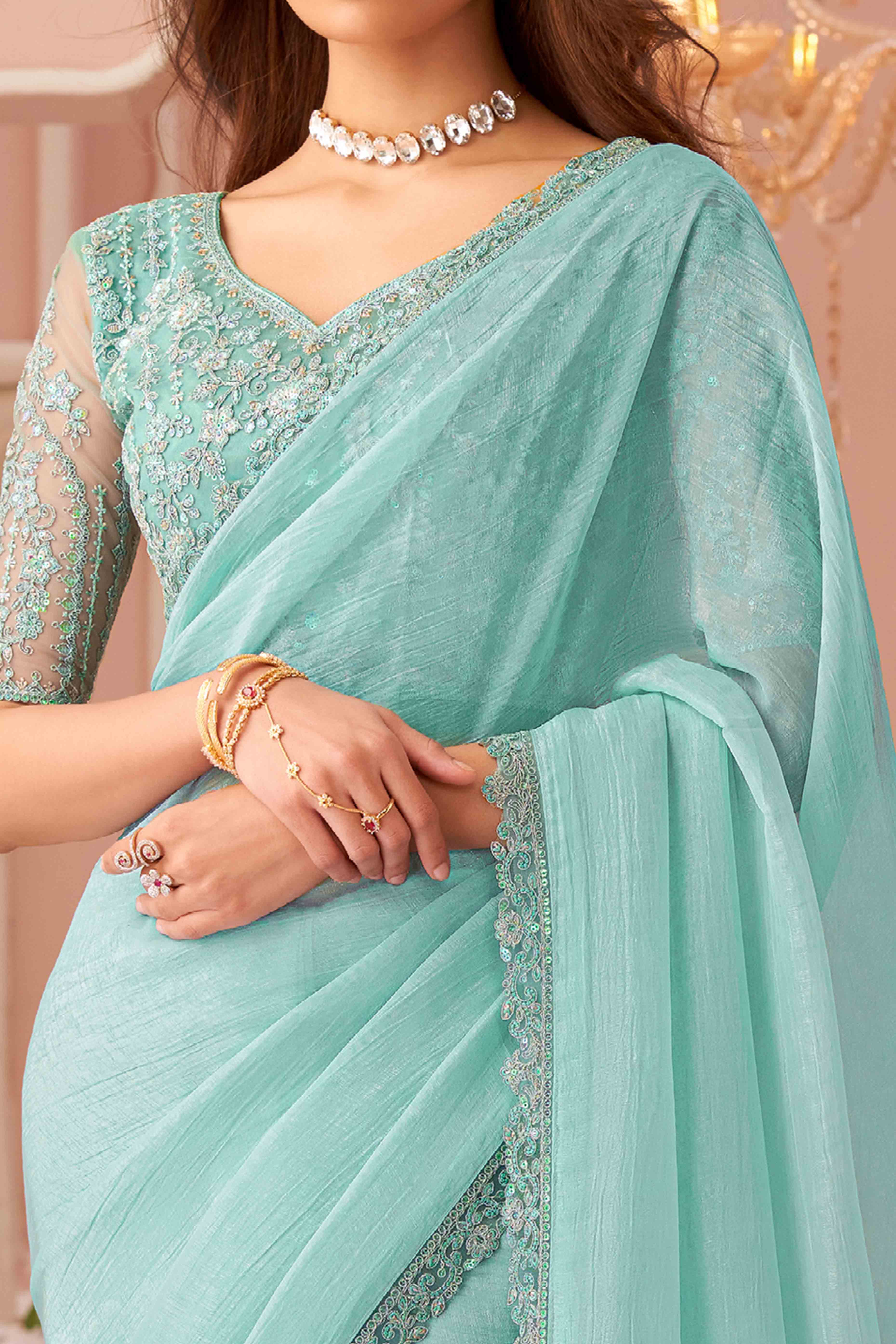 Turquoise Sequins Embroidered Georgette Saree