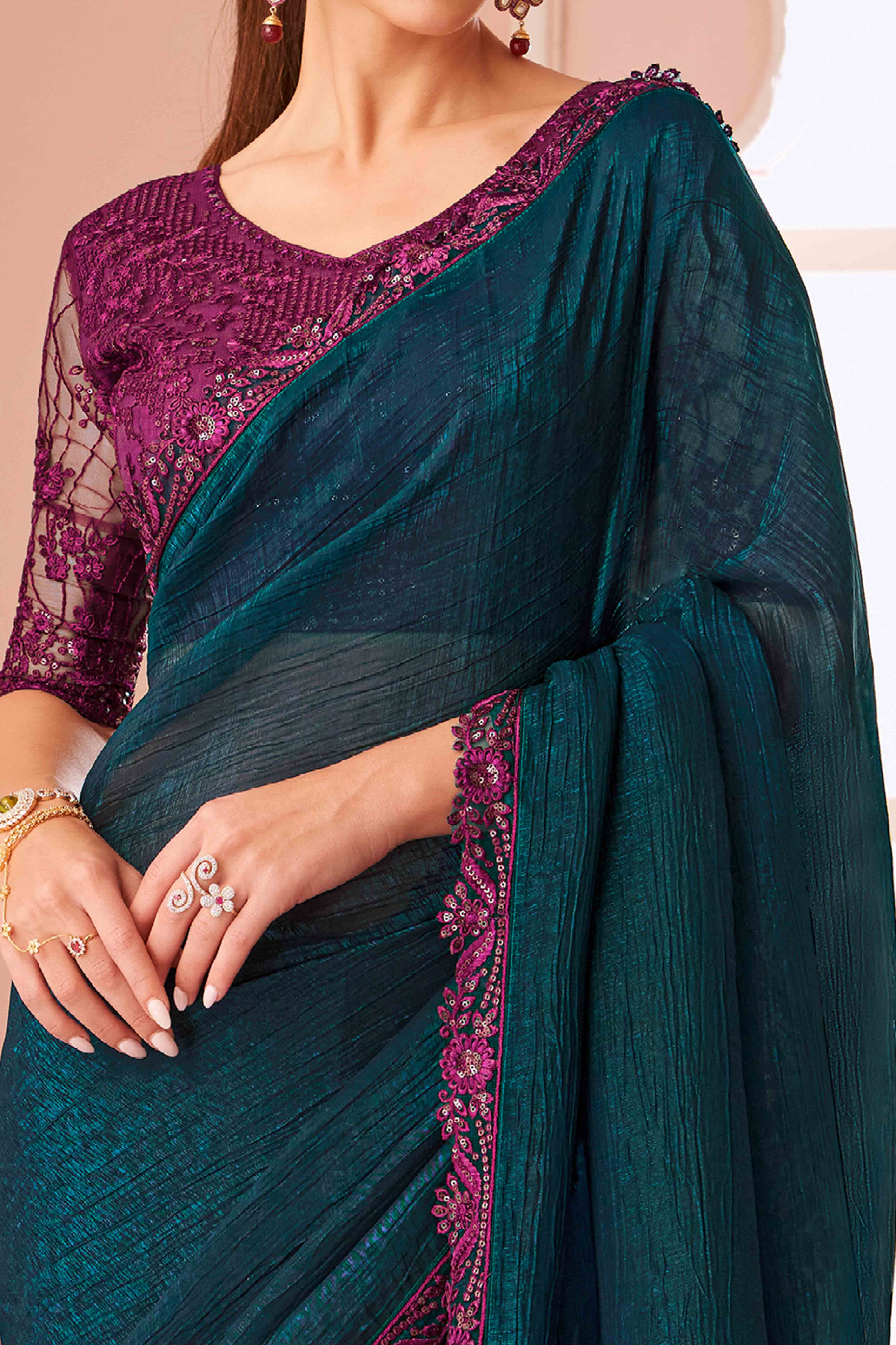 Teal Sequins Embroidered Georgette Saree